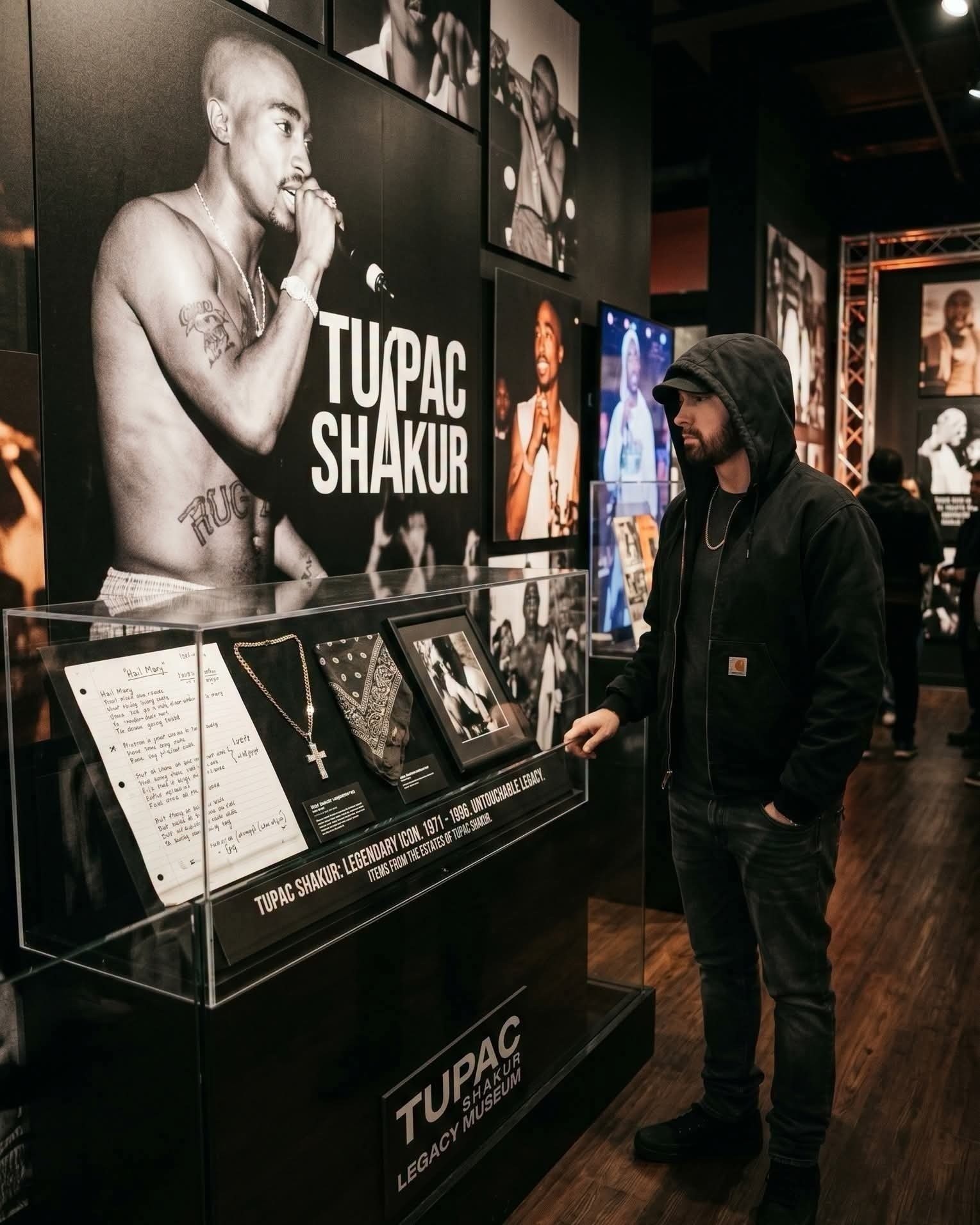 Eminem pictured paying respects at the Tupac Shakur: Wake Me When