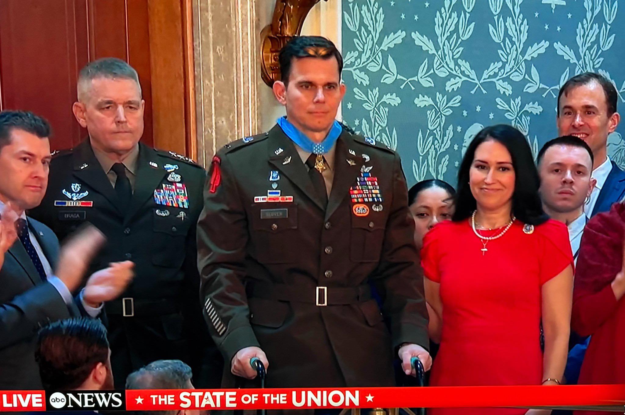 Vicki - Chinook pilot Chief Warrant Officer Eric Slover receives the ...