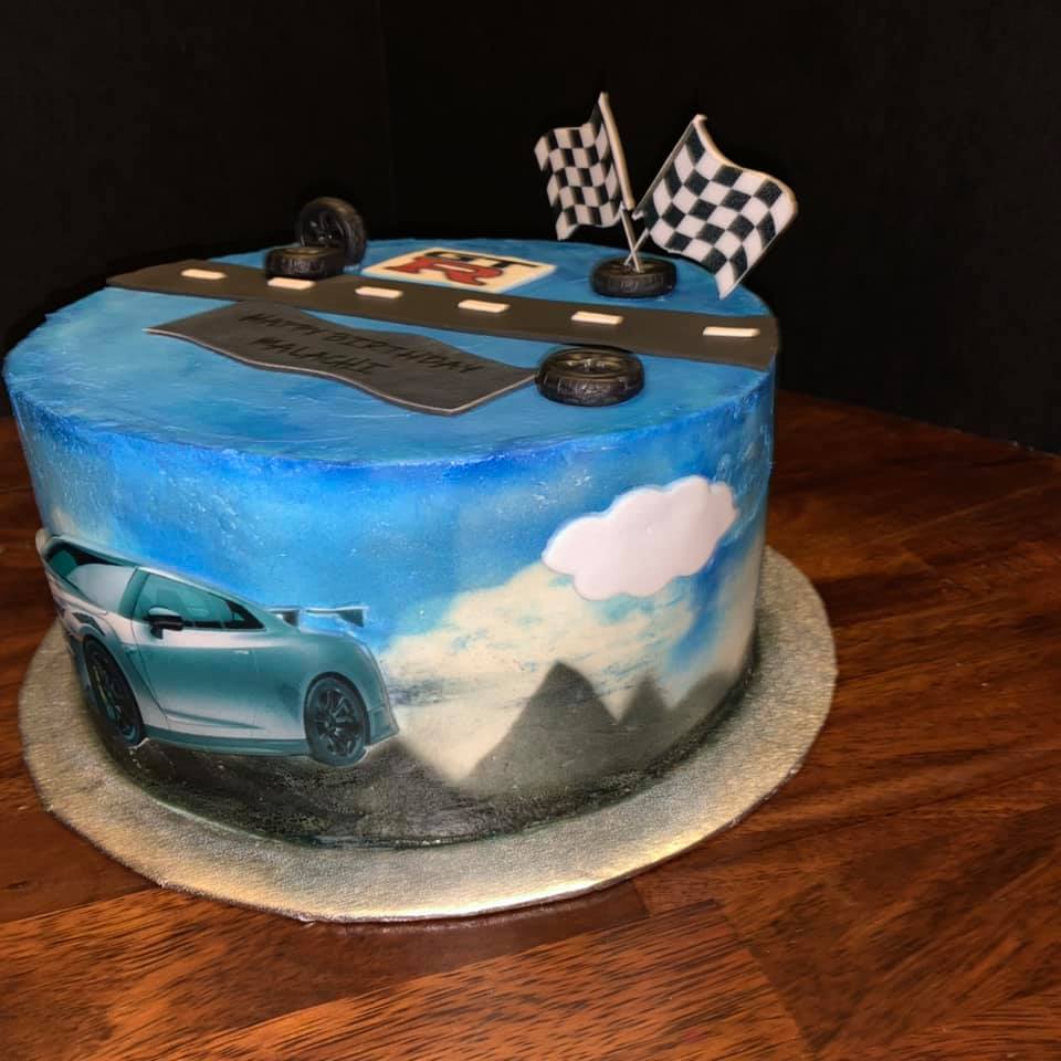 Nissan GT-R themed birthday cake. Red... - Skye Lane Bakery