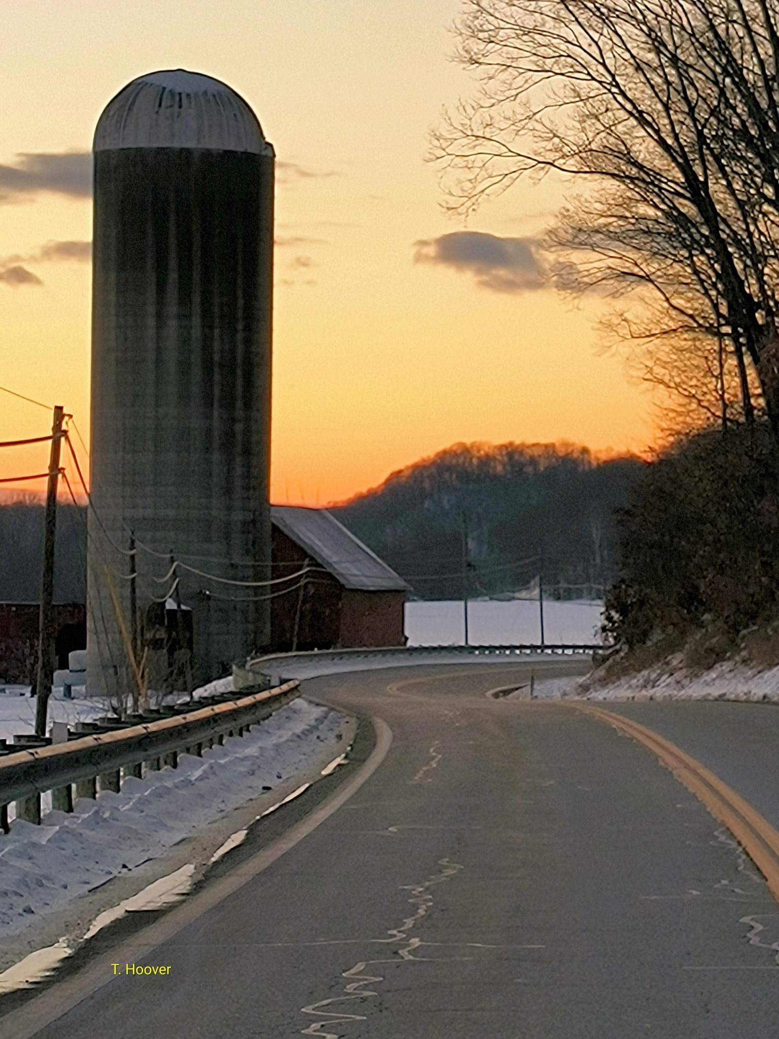 Old Farm Photography | A view down a winding road of a distant farm at ...