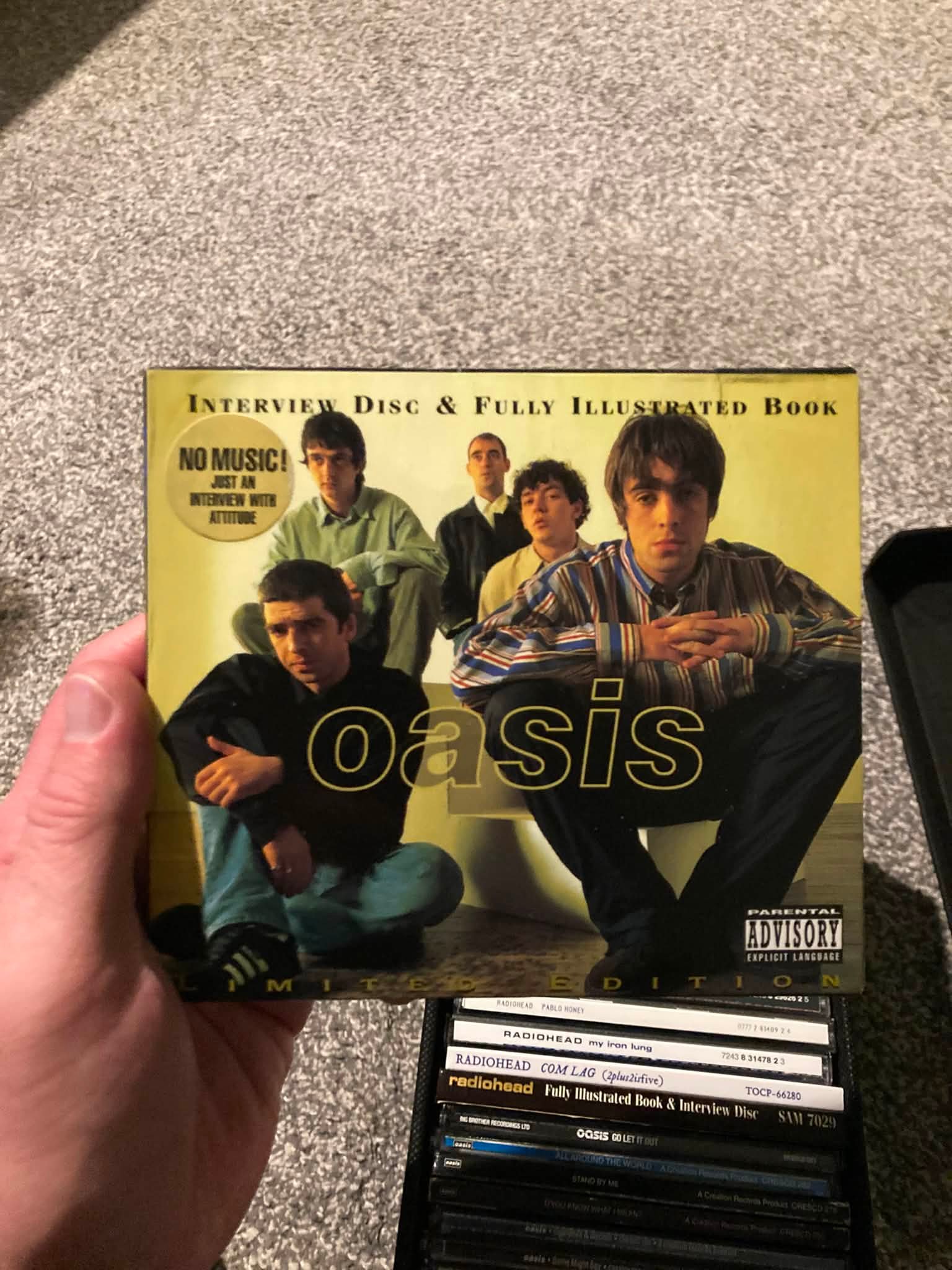 Oasis bootleg CDs with interview disc and illustrated book