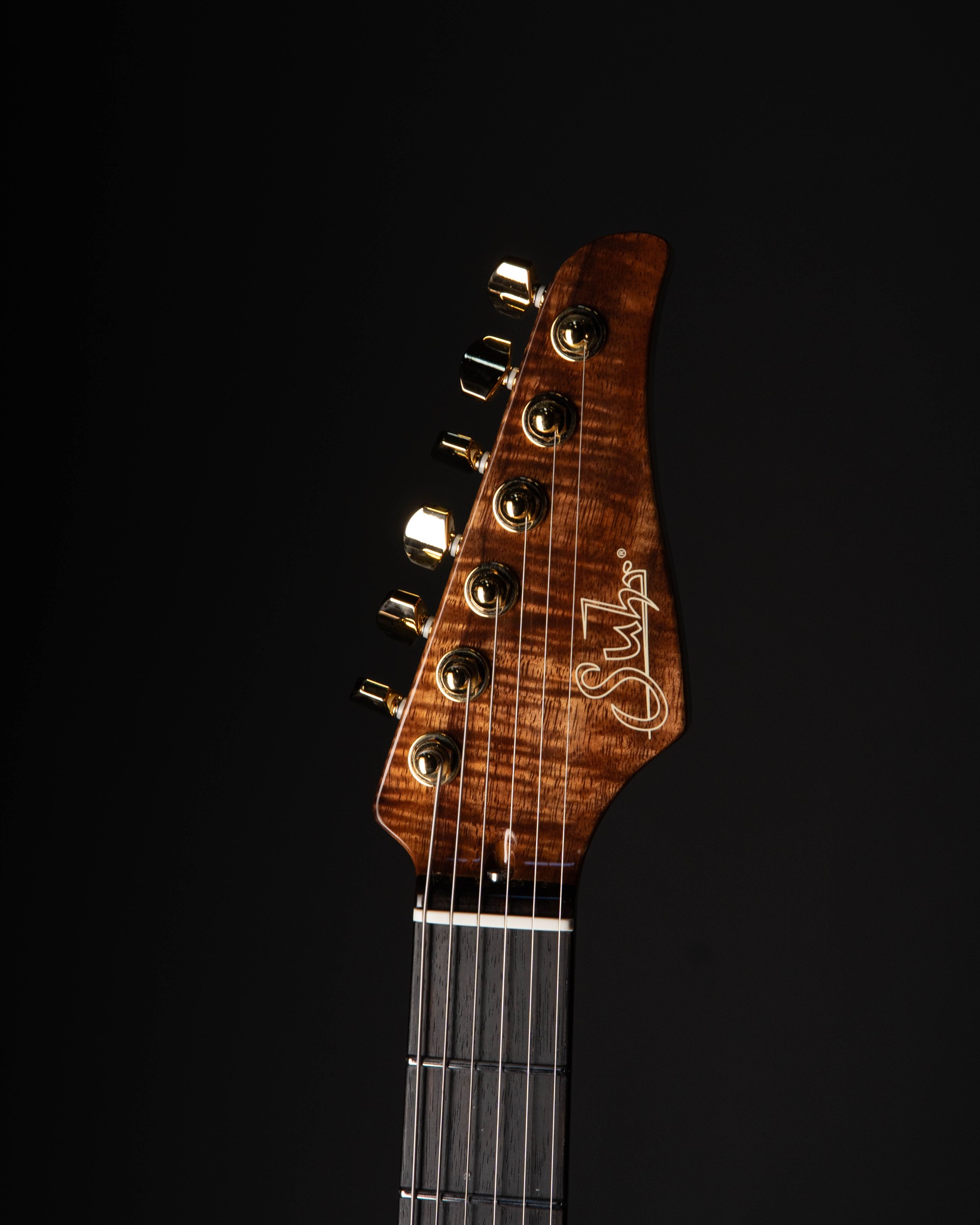 A Koa Modern Carve Top Set Neck built for the excellent folks at 