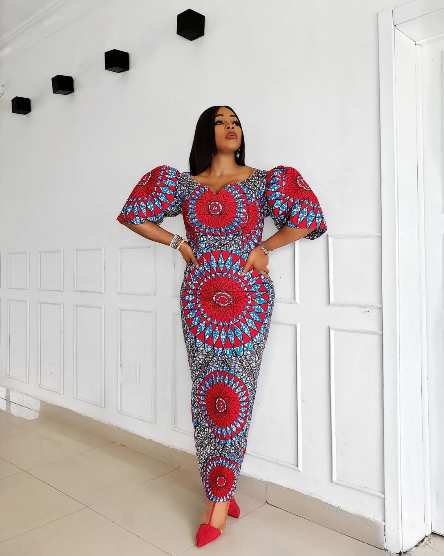 best ankara dresses for ladies This is one of the outfits I have bought on this IG streets. I bombarded you with 10 photos🤣. Personally, designs wey go make me look Rich and Sweet I swatches-frederica-plunge-maxi-dress