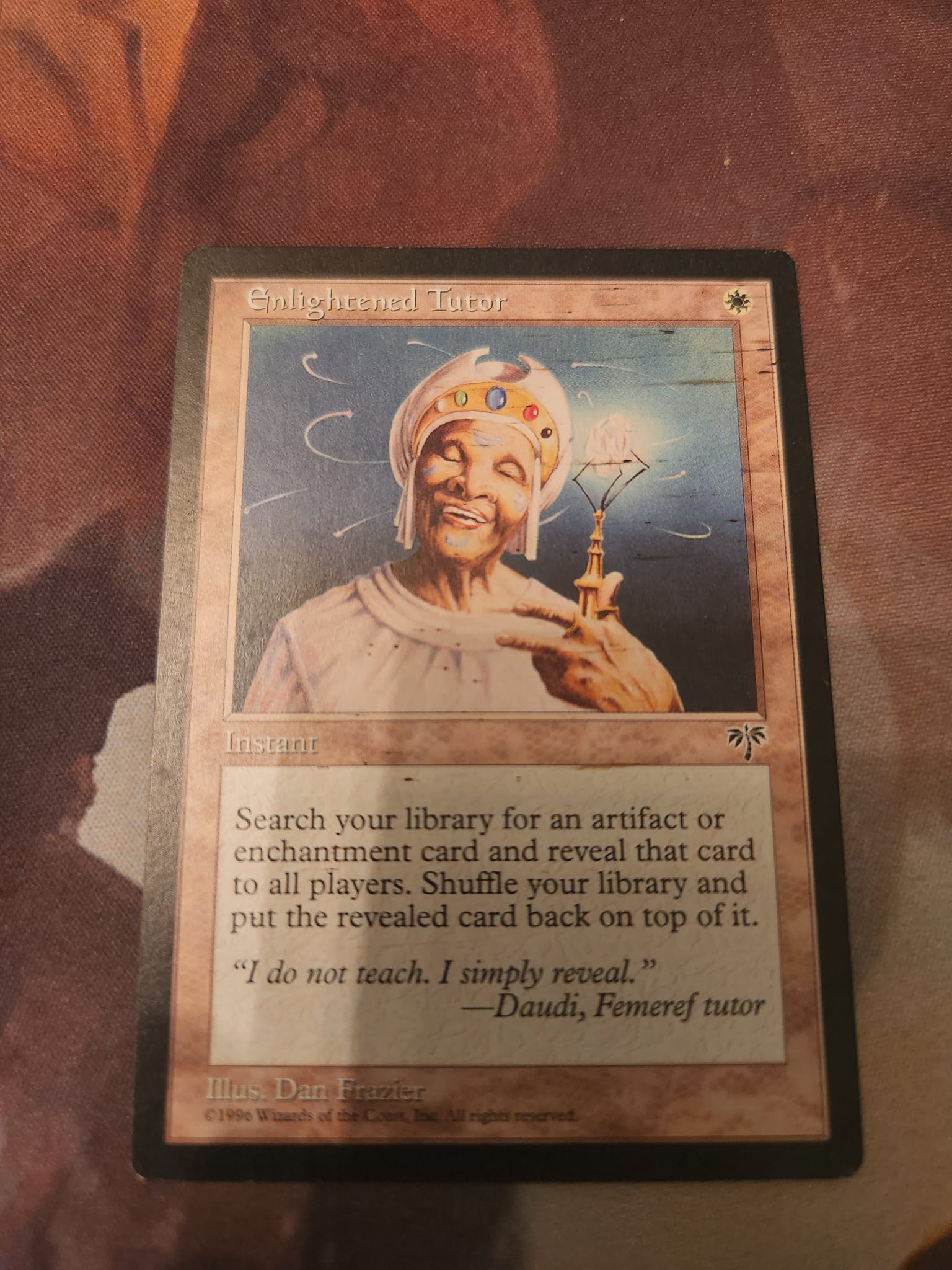 Is a print line on Arena foil Enlightened Tutor common?