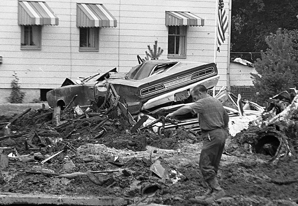 Jackson-Township - Man cleaning up around a home with a mangled car and ...