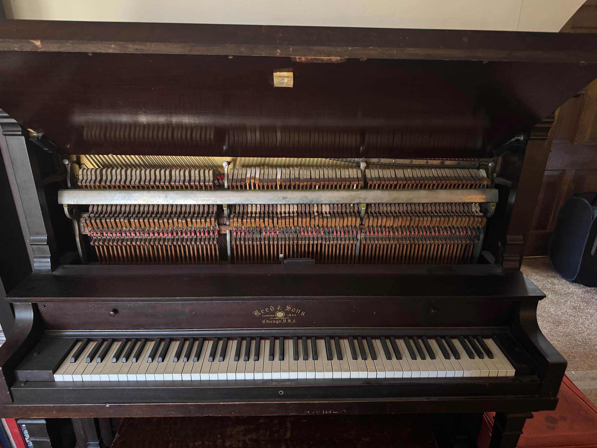 Antique Reed & Son’s Upright Piano, built in 1914. Free to whoever ...