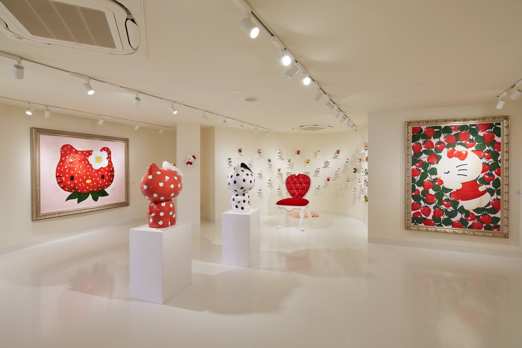 Hello Kitty figures, presented as algae, are displayed inside the 