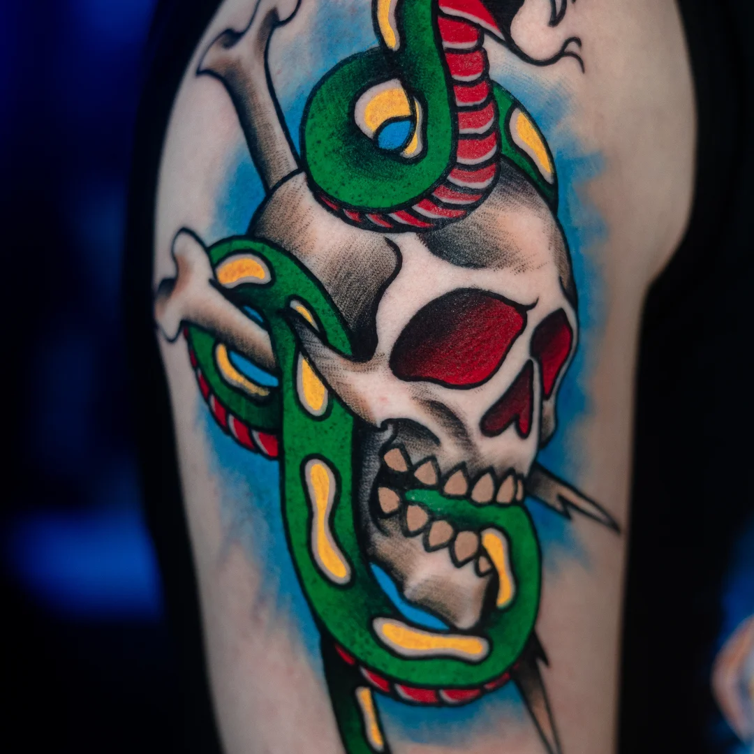 Timeless symbols, fresh ink 🐍💀 Traditional Snake and dagger by