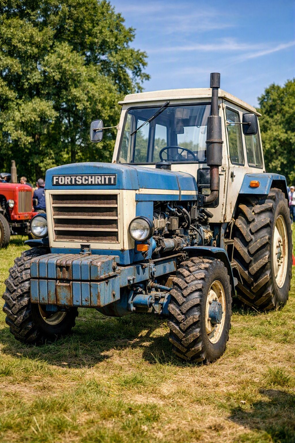 Tractor - A blue and cream vintage Fortschritt ZT 303 agricultural