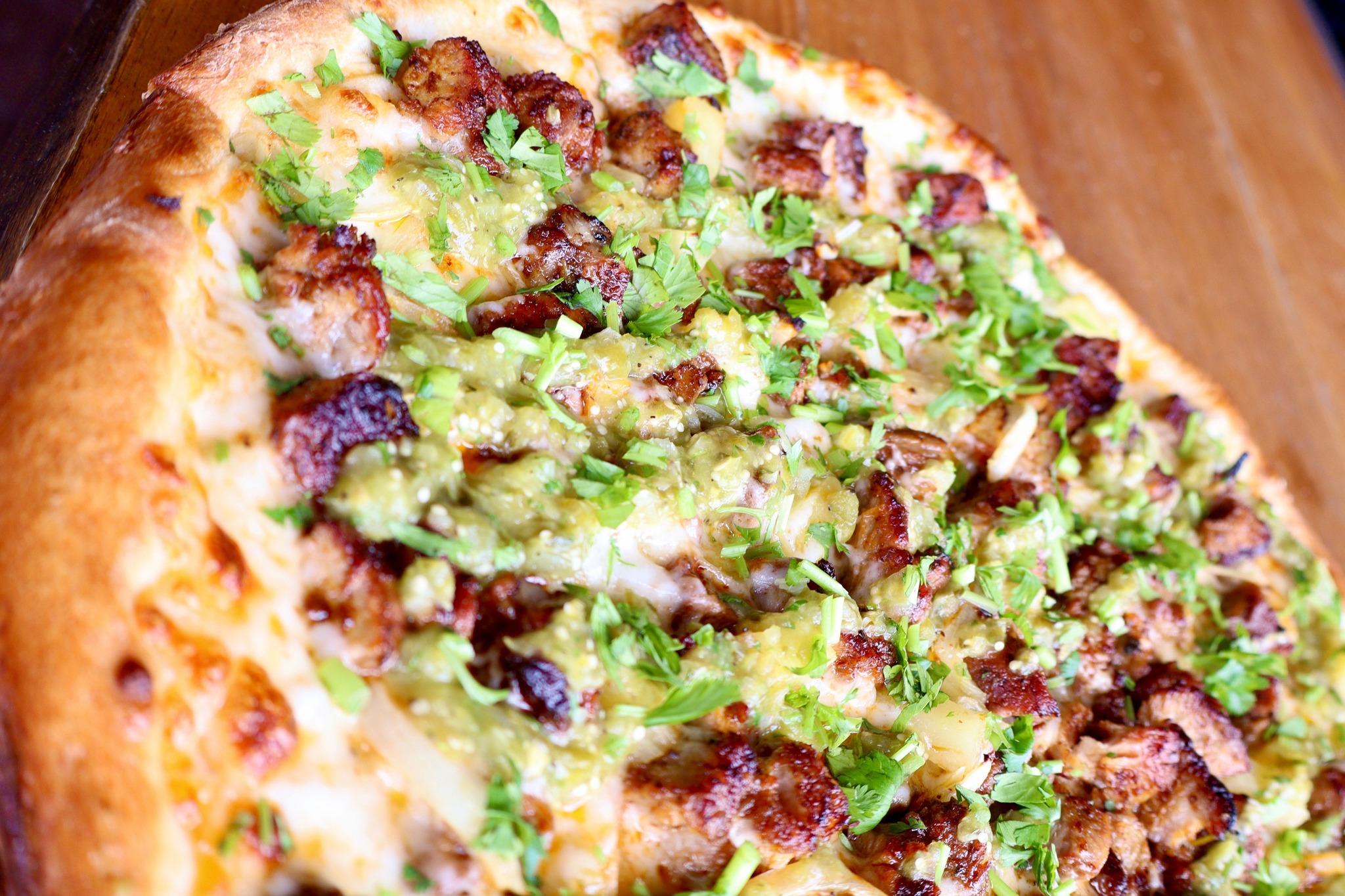 Graffiti Pizza's Al Pastor pizza with salsa verde