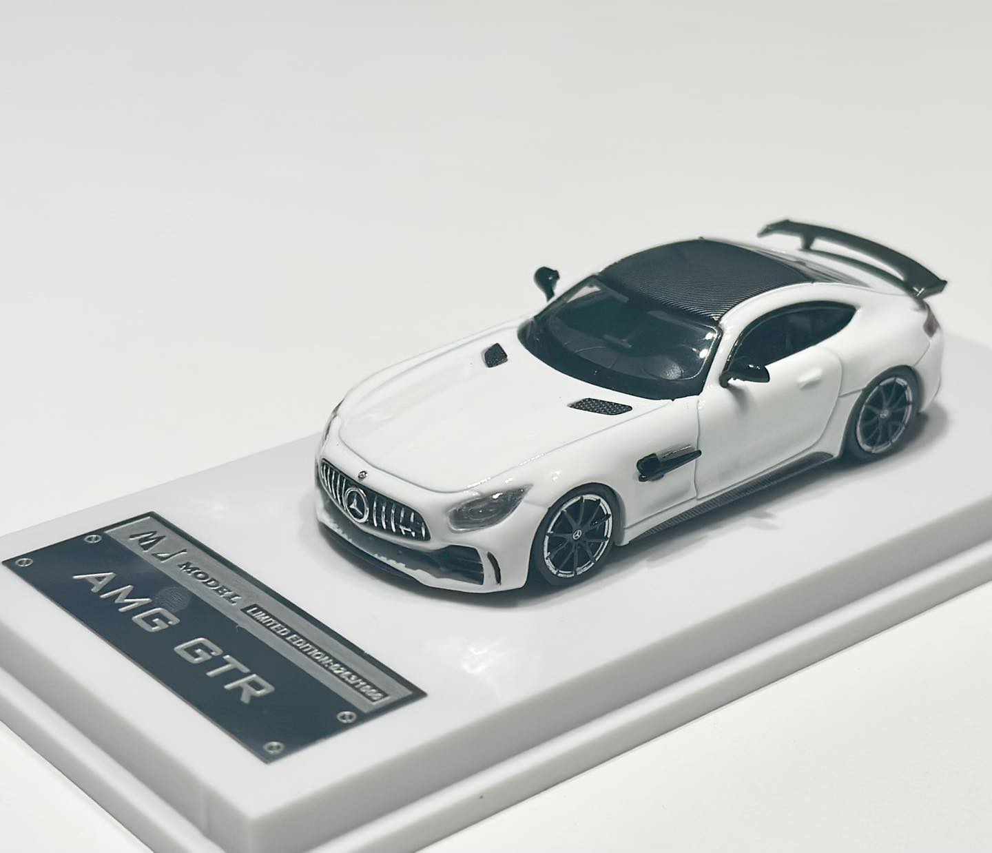 New in stock MJ Model 1/64th Mercedes Benz AMG GTR White/Carbon 