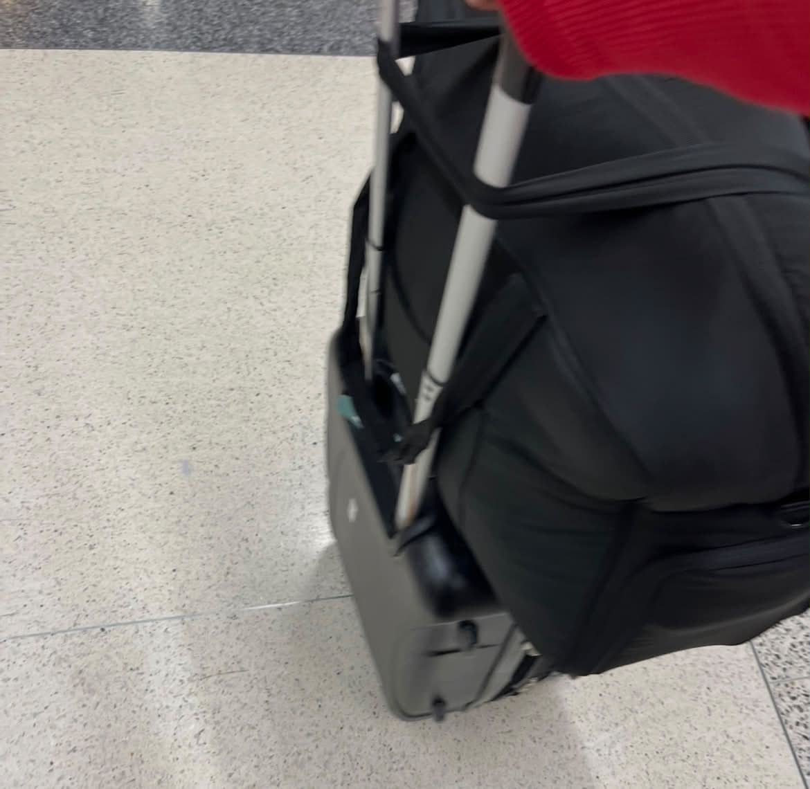 Lost black and pink duffle bag delivered to wrong house in Gainesville