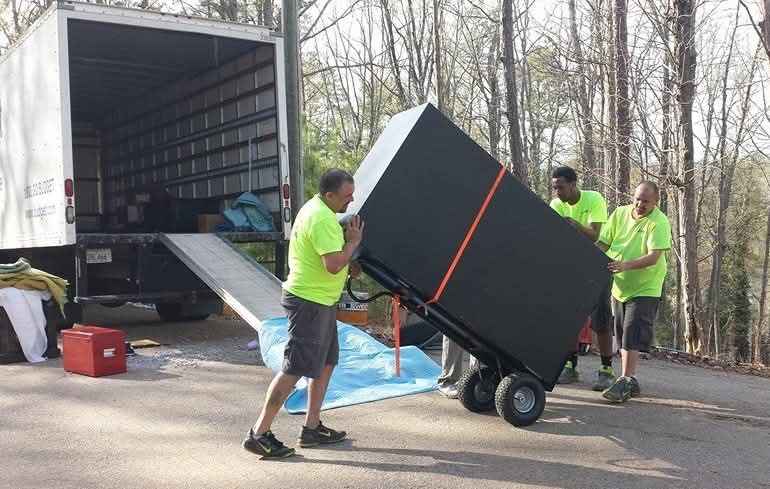 Local Moving Helpers - by MovingHelpCenter.com | Gun safe loaded into a ...