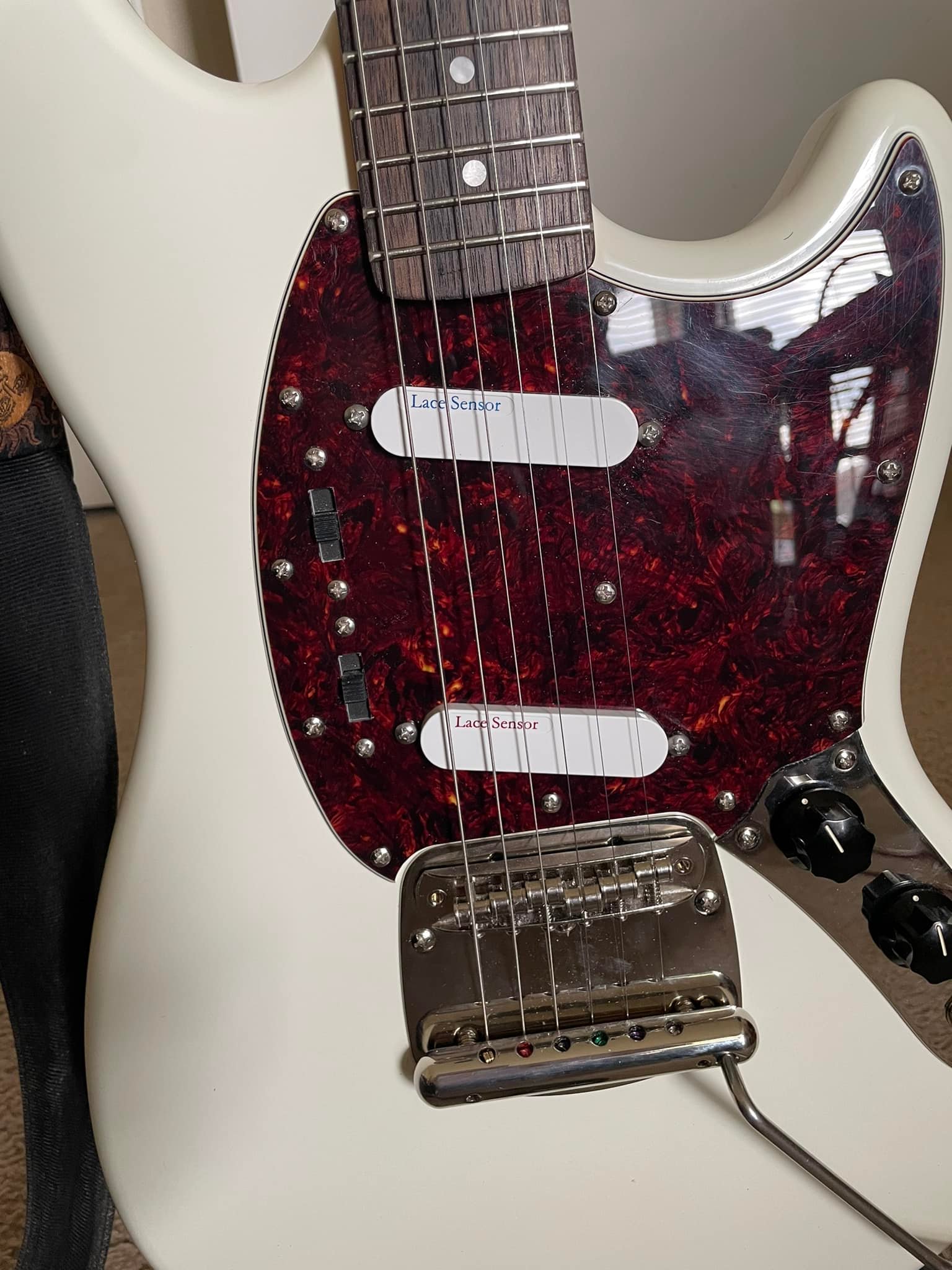 My fender modern player with red lace sensors in the bridge