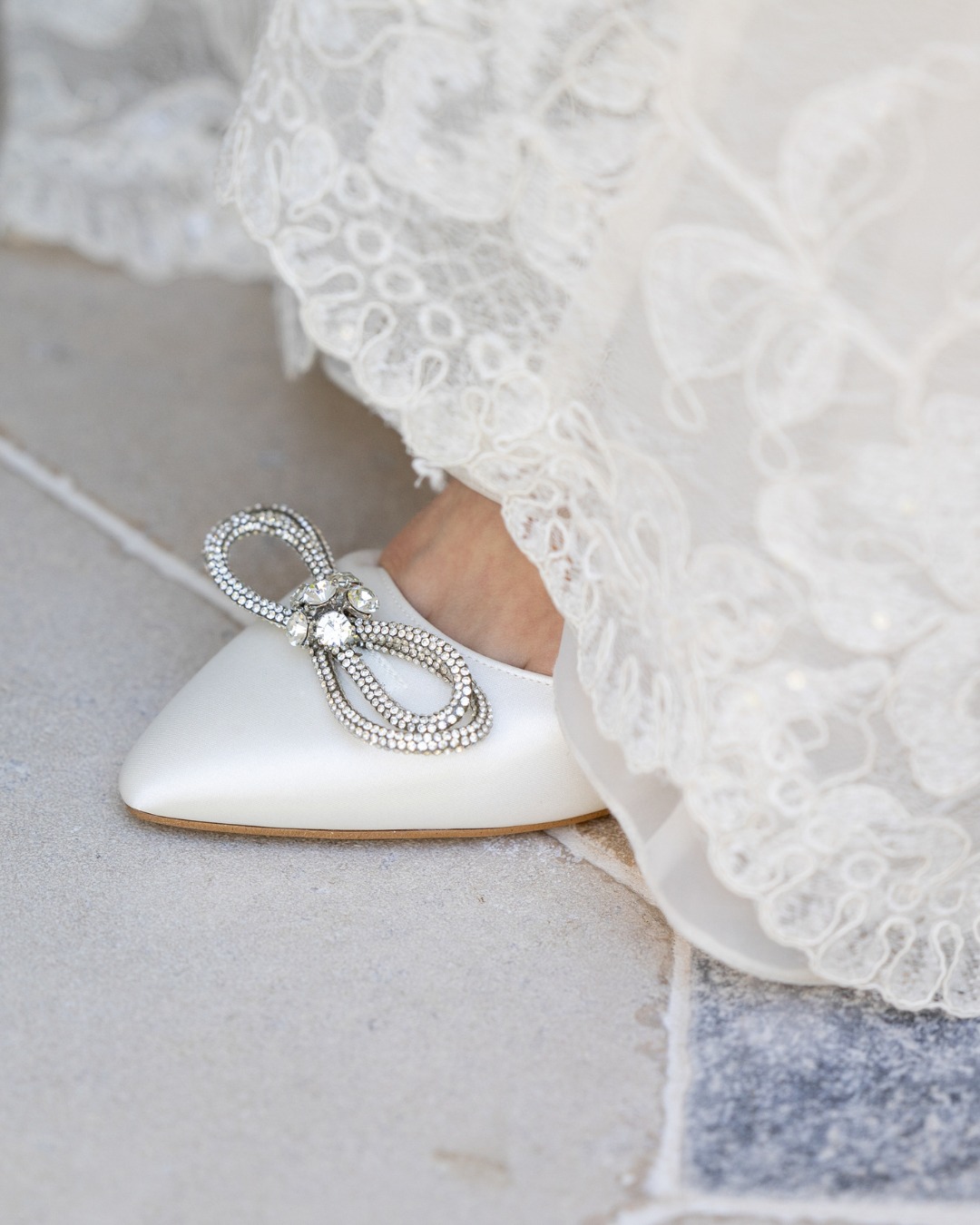 silver shoes with ivory wedding dress The perfect bridal look starts the perfect step. ✨ JOVITA from Avalia transforms a classic satin silhouette into a statement piece with sparkling embellishments, ornamental stones, and refined details Wrist Corsages