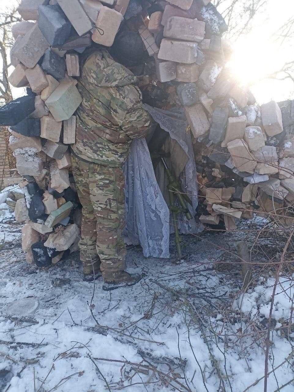 Russian camouflage netting designed to look like piles of rubble