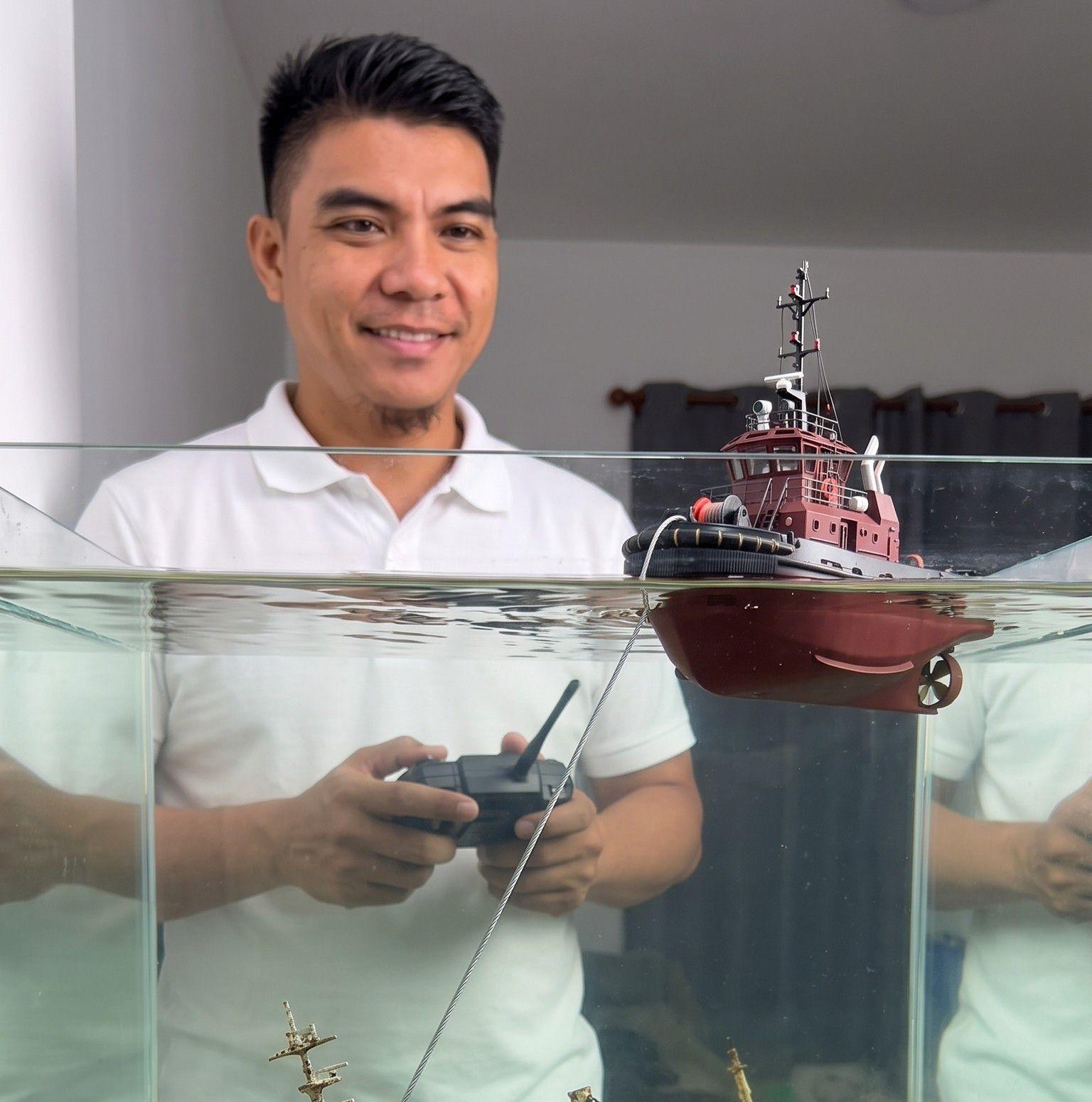 A submarine wedged deep inside a wreck! Two lifting cables, one tiny ...