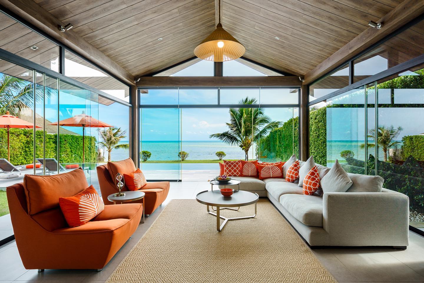 A private beachfront pool villa looking out over the white sandy beach ...