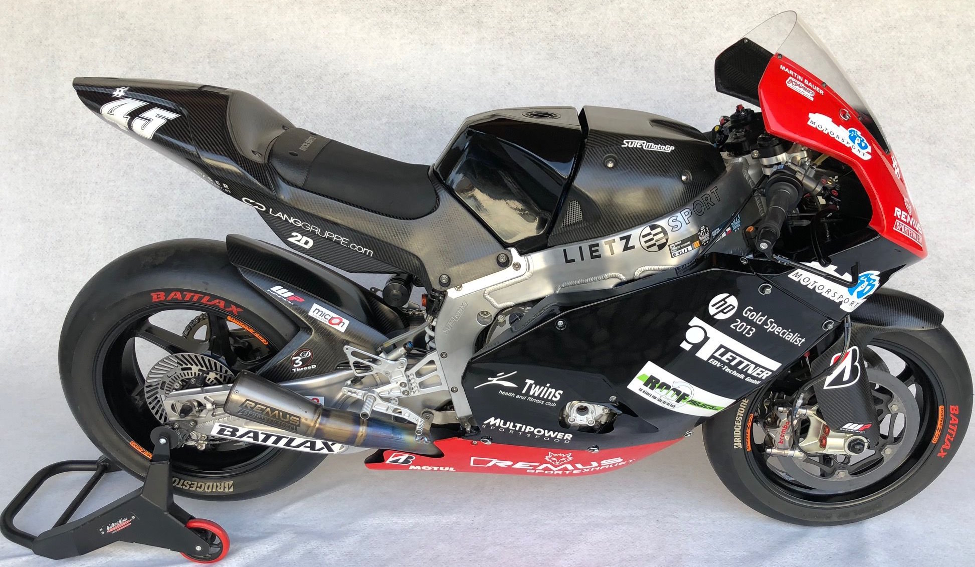 A Suter MMX1 MotoGP bike, from 2012, the 'CRT' era, a passing