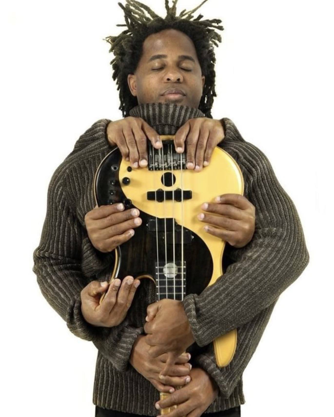 A Jaco Pastorius figurine.