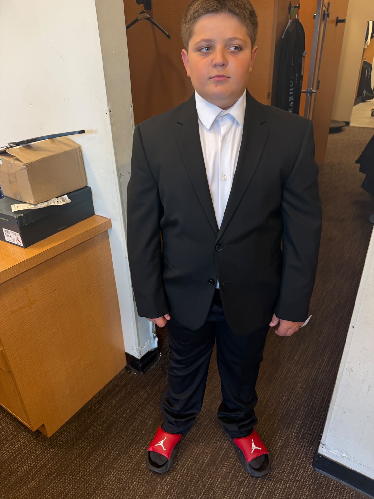 Trying on homecoming suits