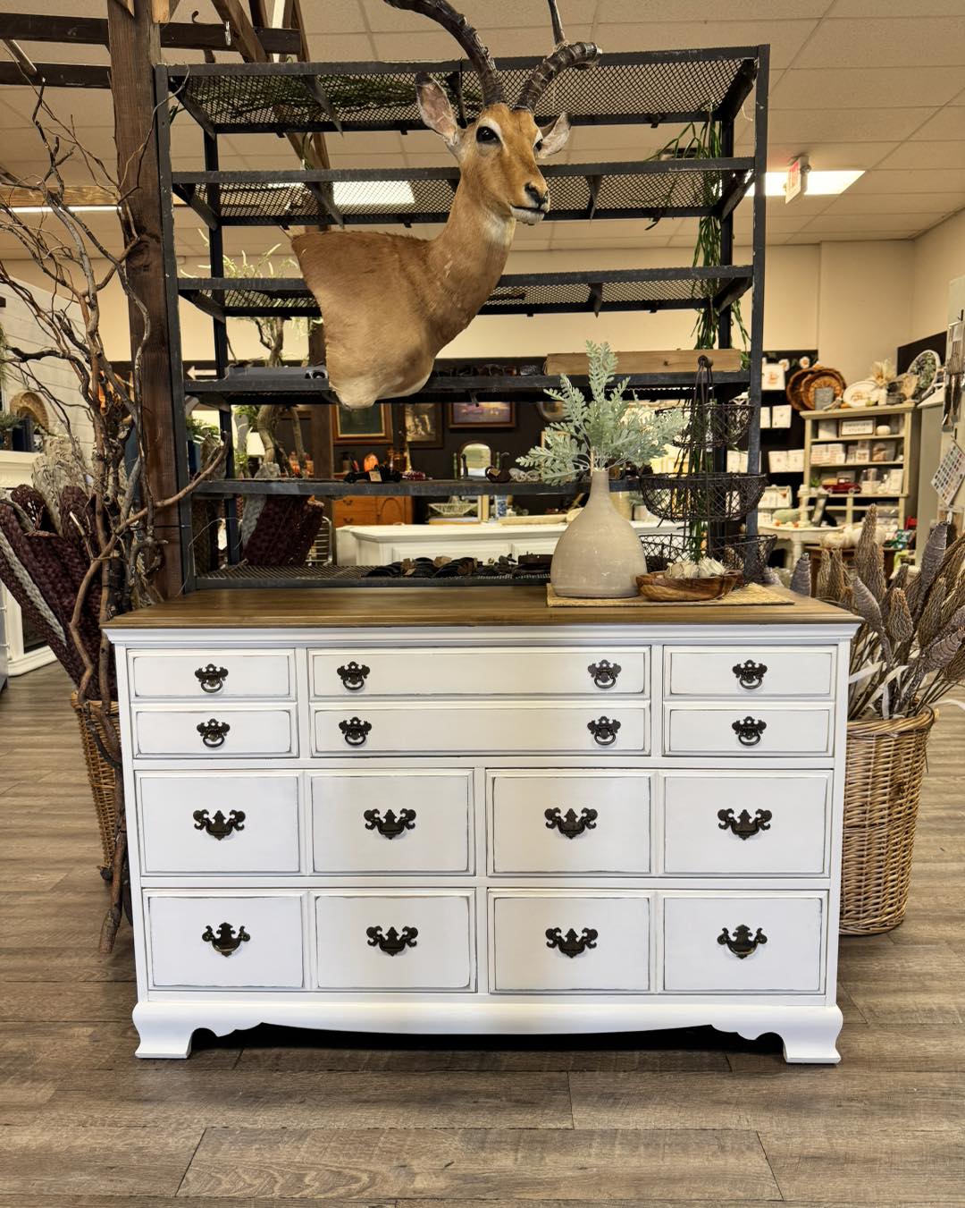 This long white dresser is absolutely gorgeous! The beautiful white finish paired with the dark top gives it the perfect contrast and a timeless look that would work beautifully in so many