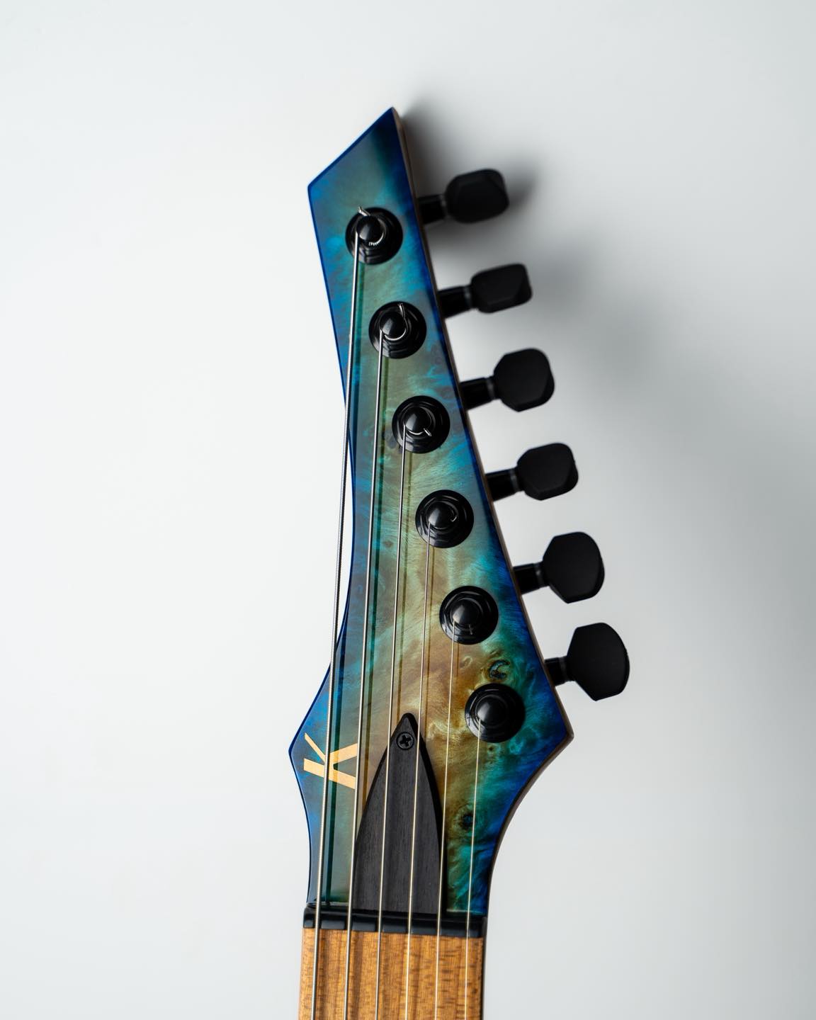 Kiesel - Our head guitar tech finishing up a setup on a JB24 Jason