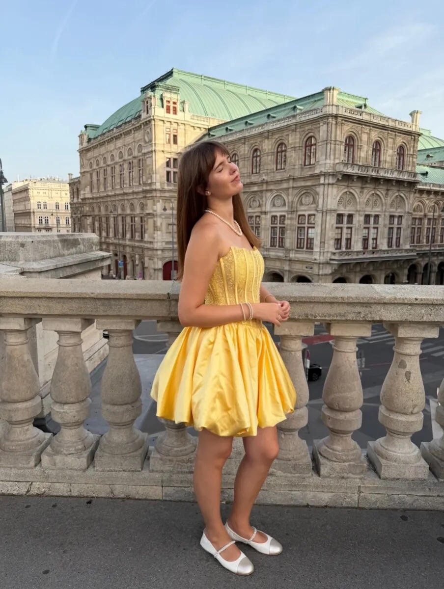 homecoming dresses no sparkles Bright, fun, and full of sparkle 💛✨ This yellow A-line dress features a strapless sheer corset, pearl details, and a lace-up back for the perfect party-ready look. Would you wear yellow this dress effortlessly combines