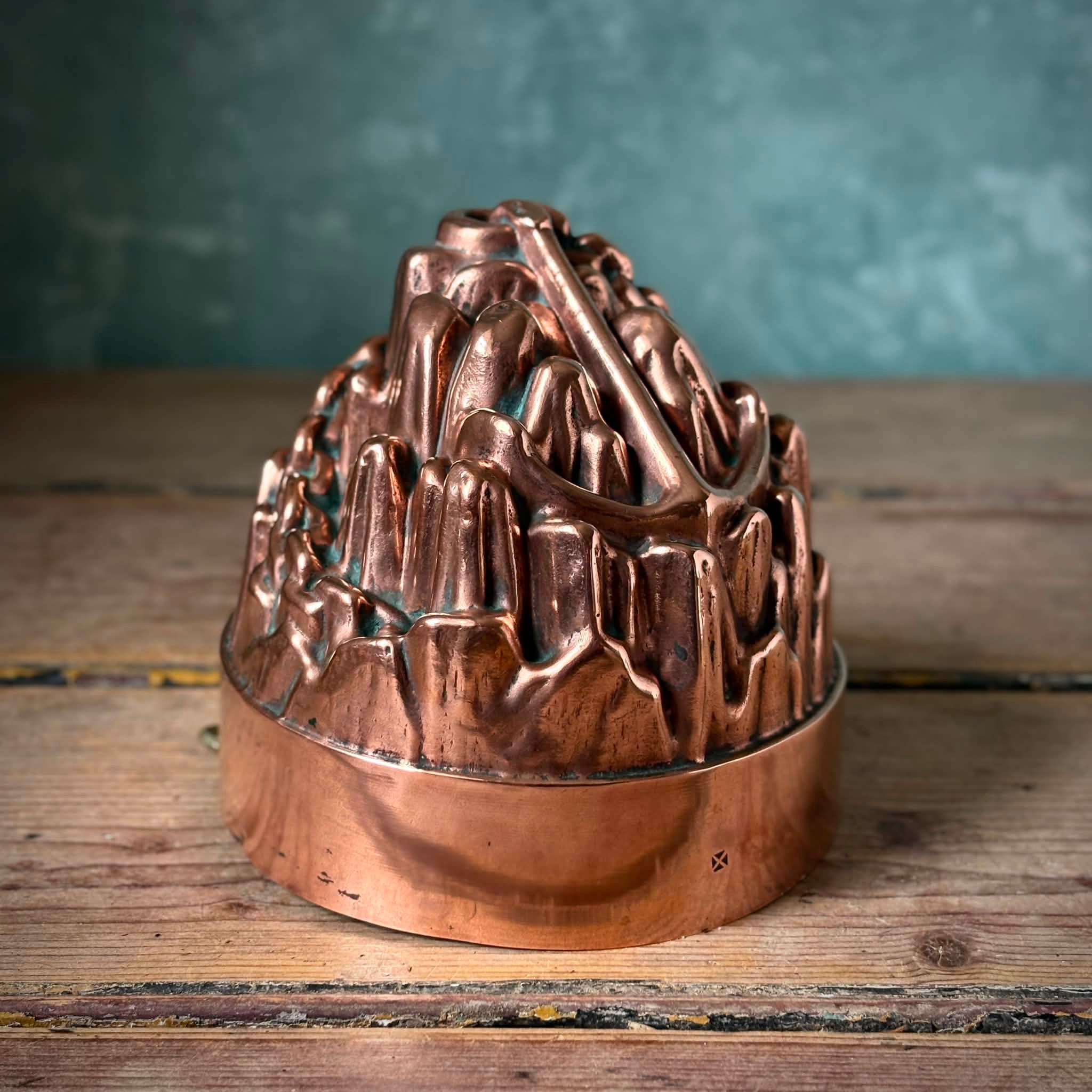 A collection of four beautiful Victorian copper jelly molds, three