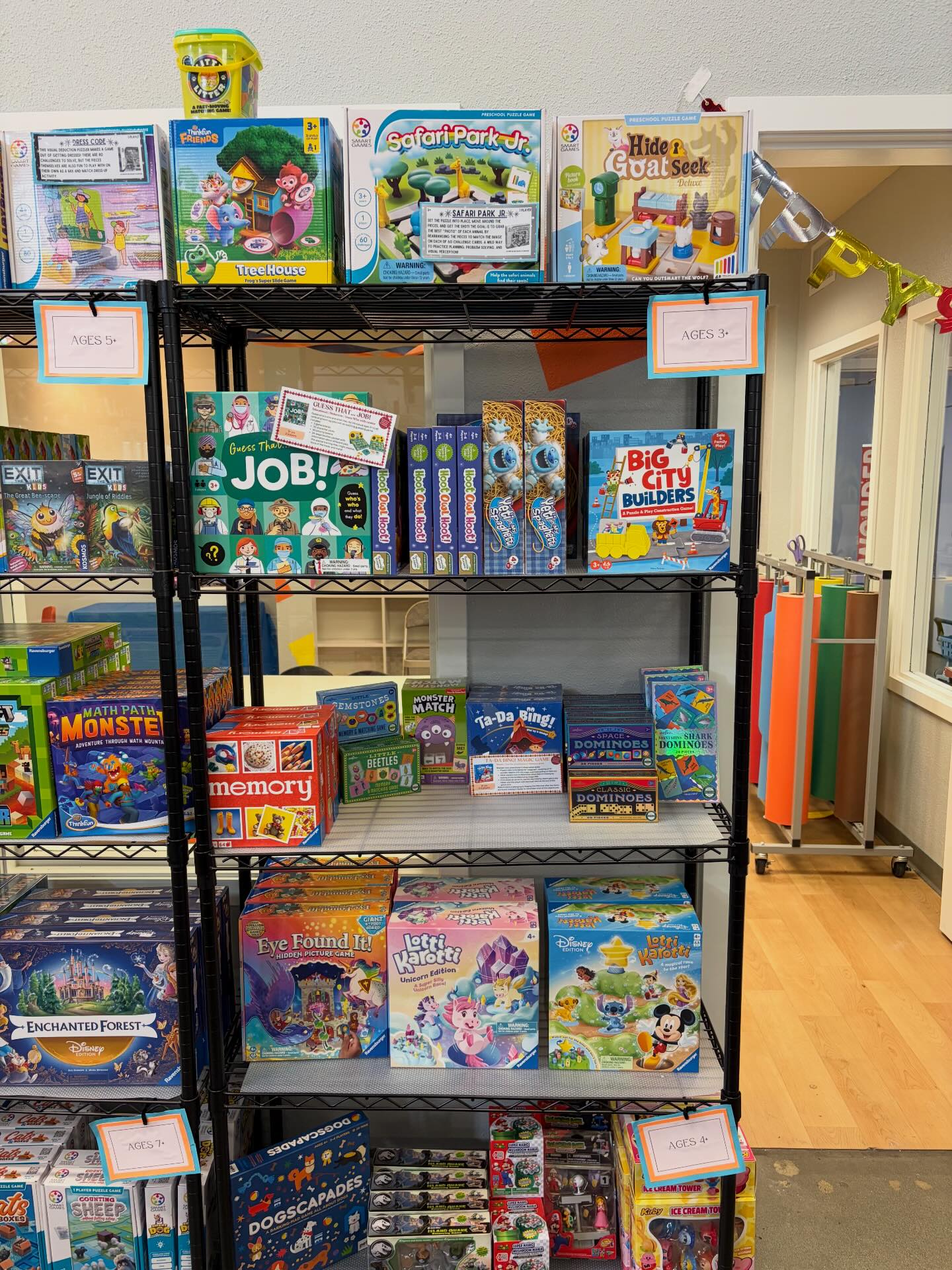 We have restocked our wall of games! All organized by age so you 