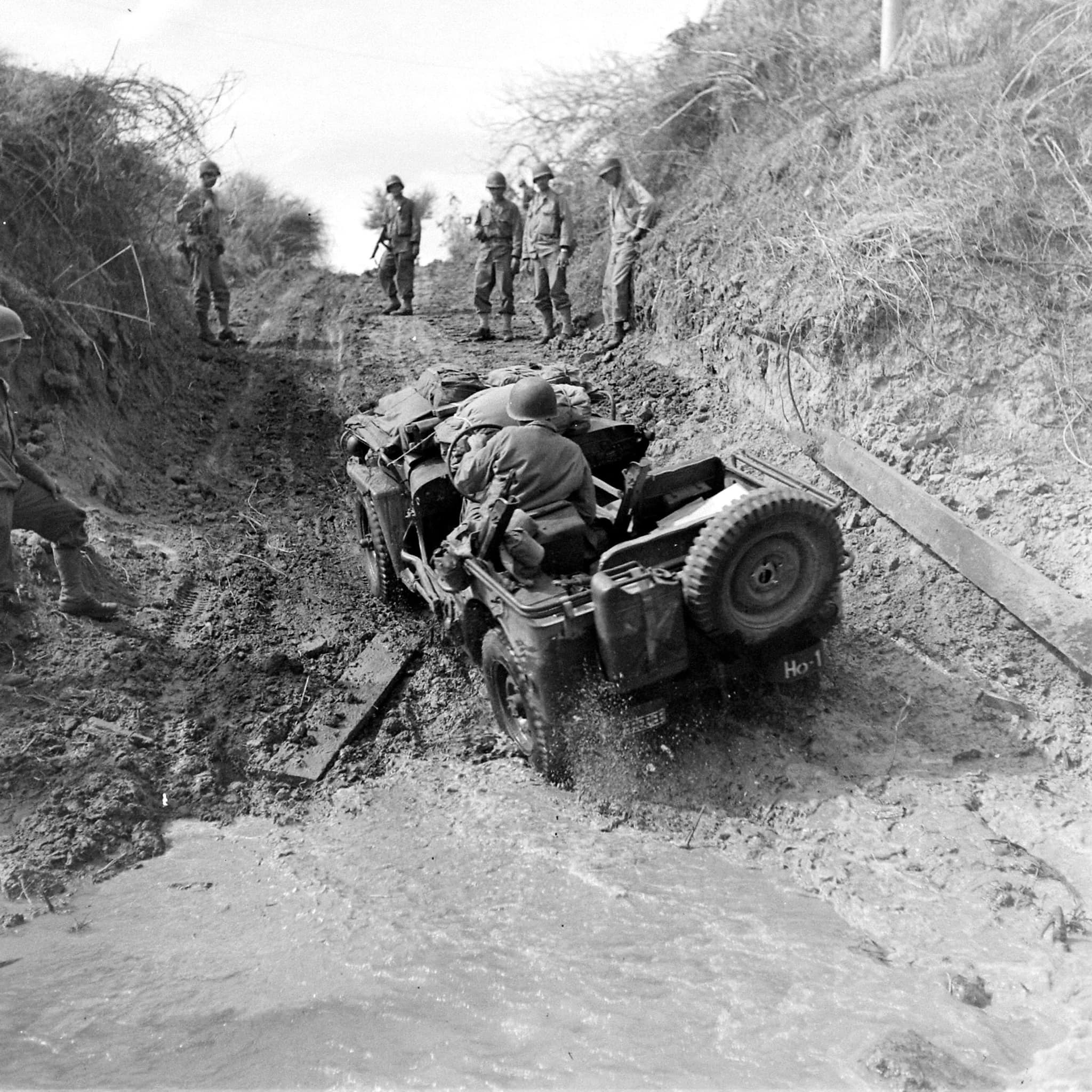 World - US Jeeps cross a muddy ravine near Capas, Philippines - Early ...