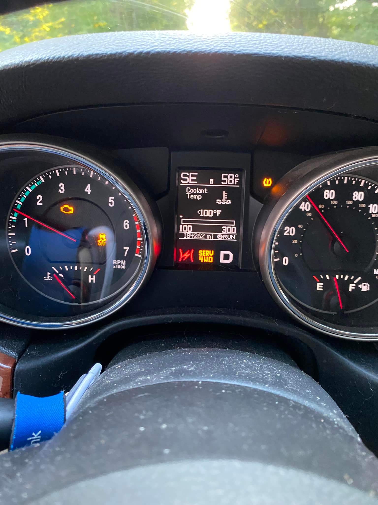 What could be causing the overheating issue and dash lights in a