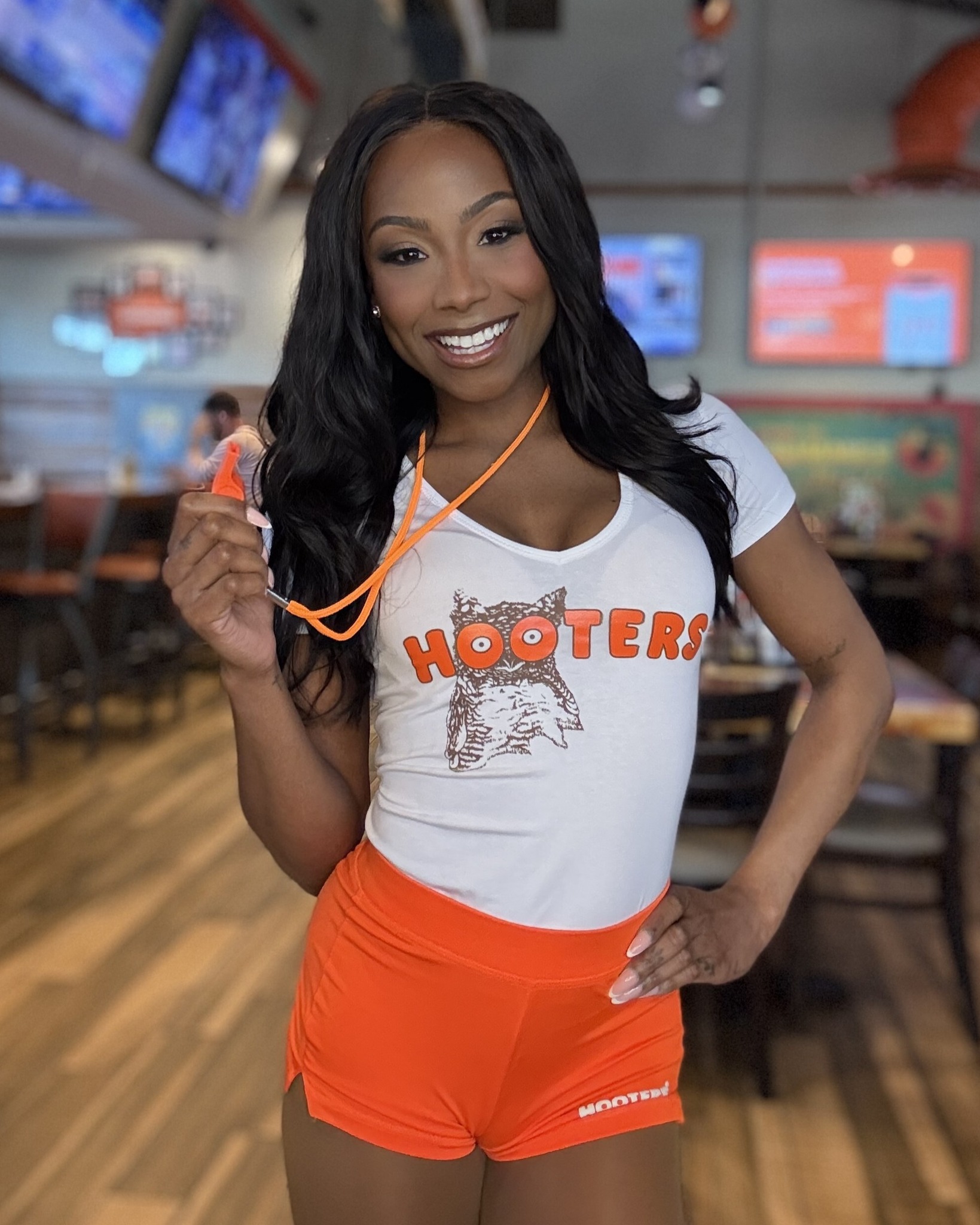Hooters - Always living, laughing and loving in the orange shorts