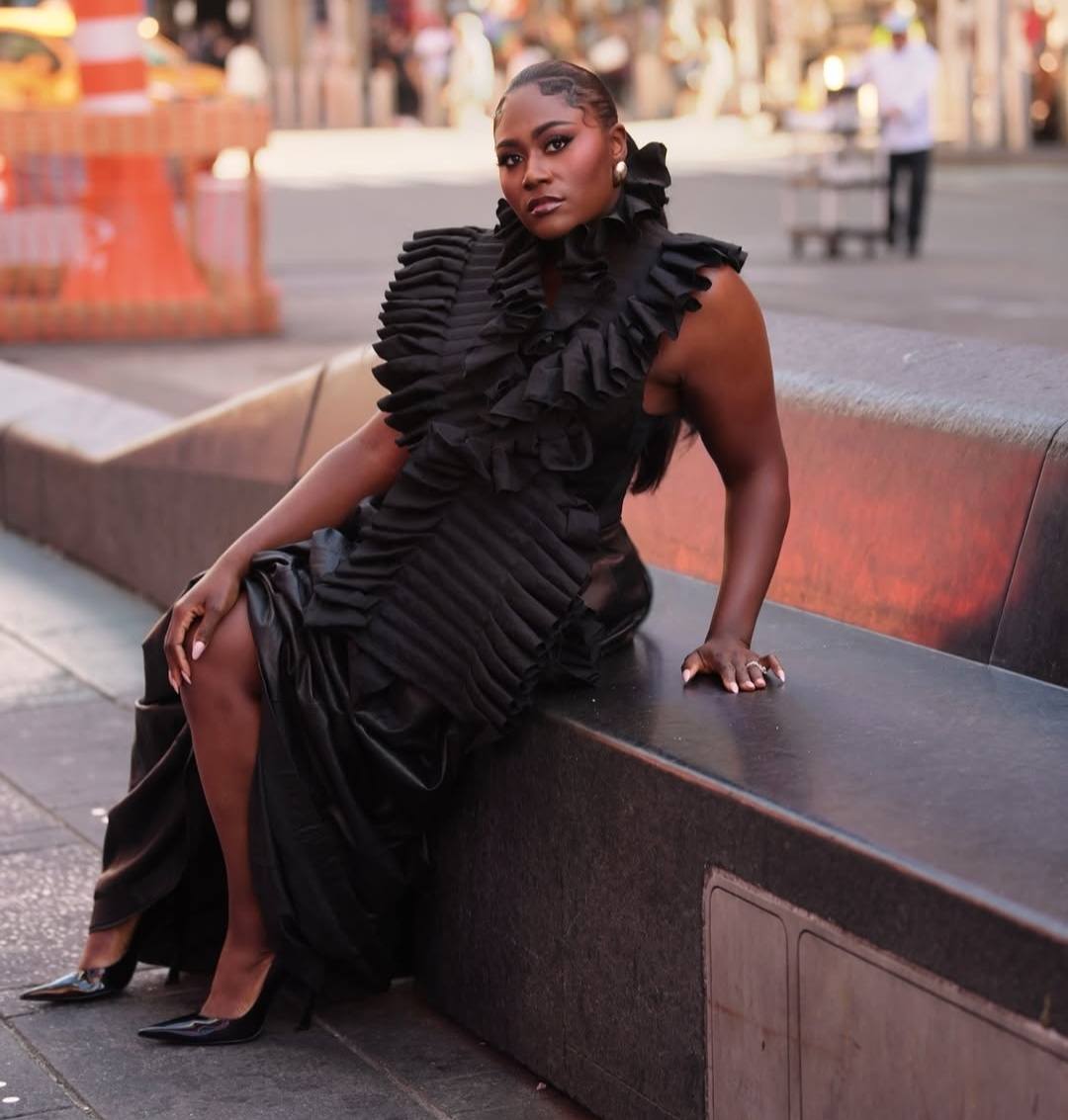 Danielle Brooks is serving BLACK ELEGANCE! 🖤 The dramatic ruffles, sleek silhouette, and fierce heels make this look a true fashion statement! She is giving CONFIDENCE, CLASS & HIGH FASHION! 🔥 Rate