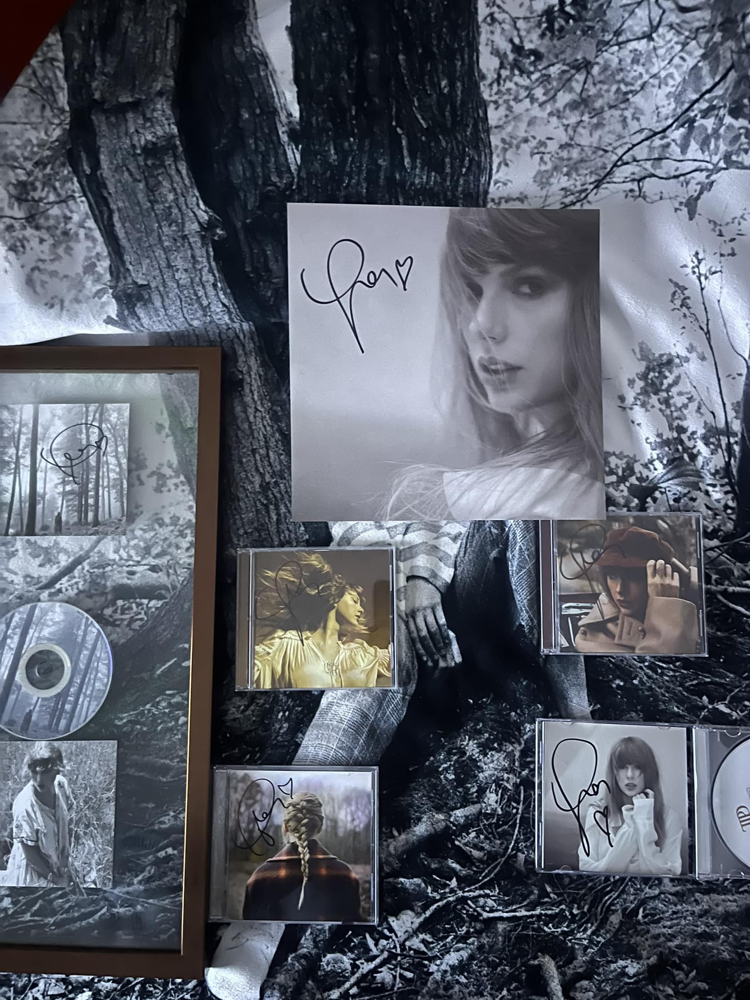 Taylor Swift fan collects signed TTPD cd with a heart