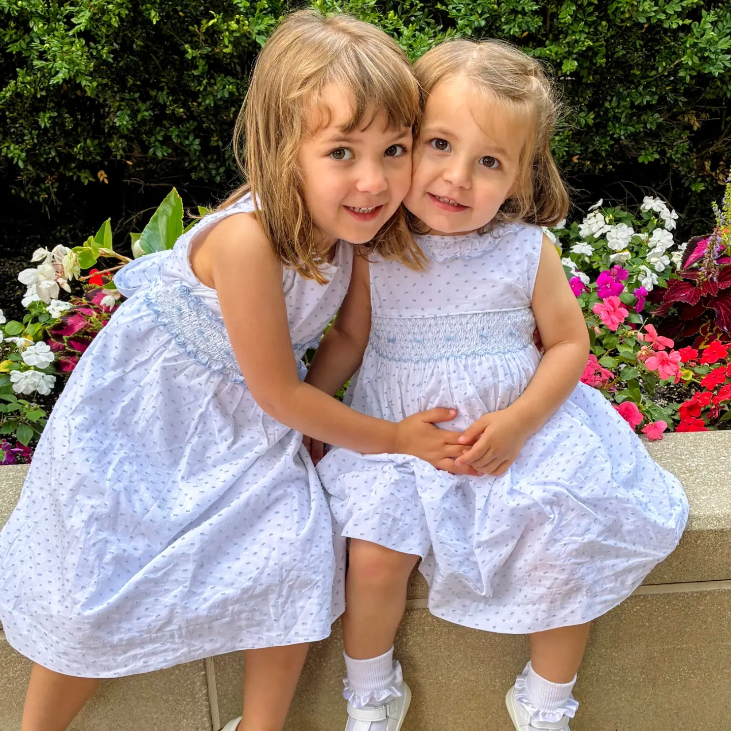 Classic matching dresses for siblings at The Blue Horse