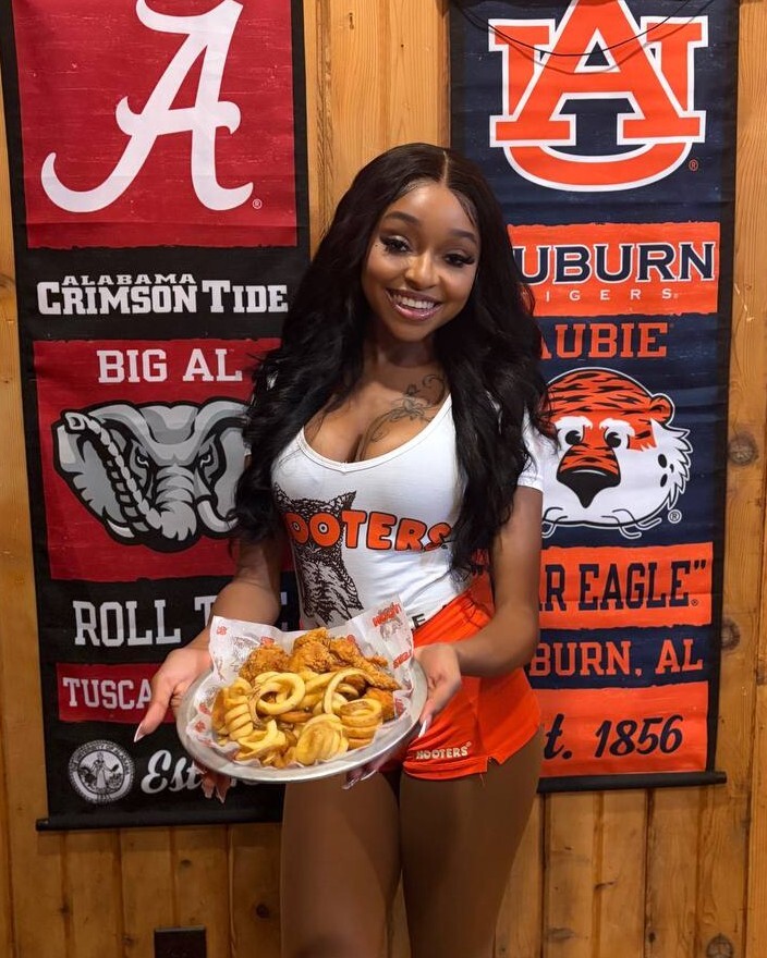 Hooters - Always living, laughing and loving in the orange shorts