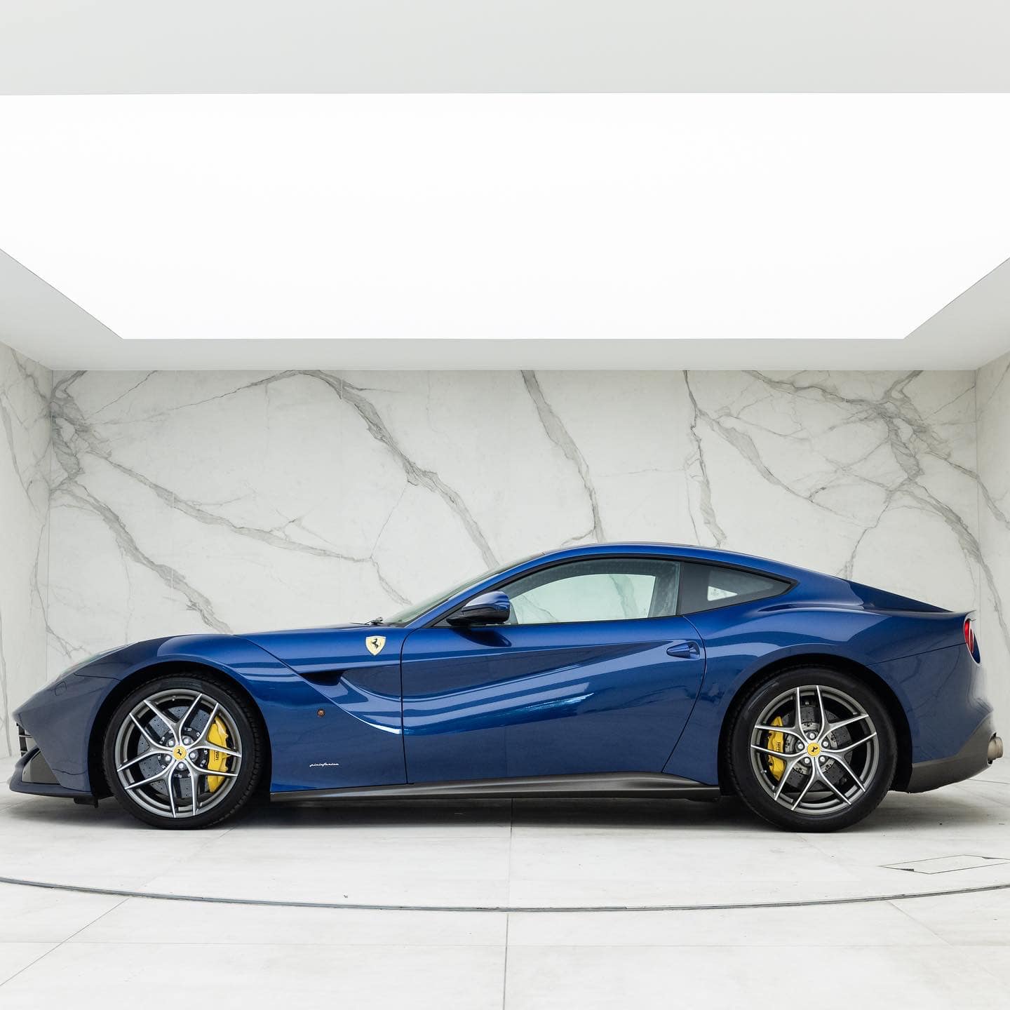Who orders a Ferrari in blue and green? This F12Berlinetta's first