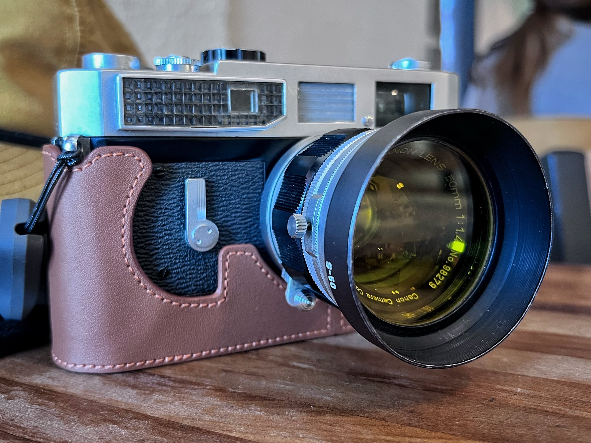 Canon model 7 with 50mm f/1.4 lens and accessories