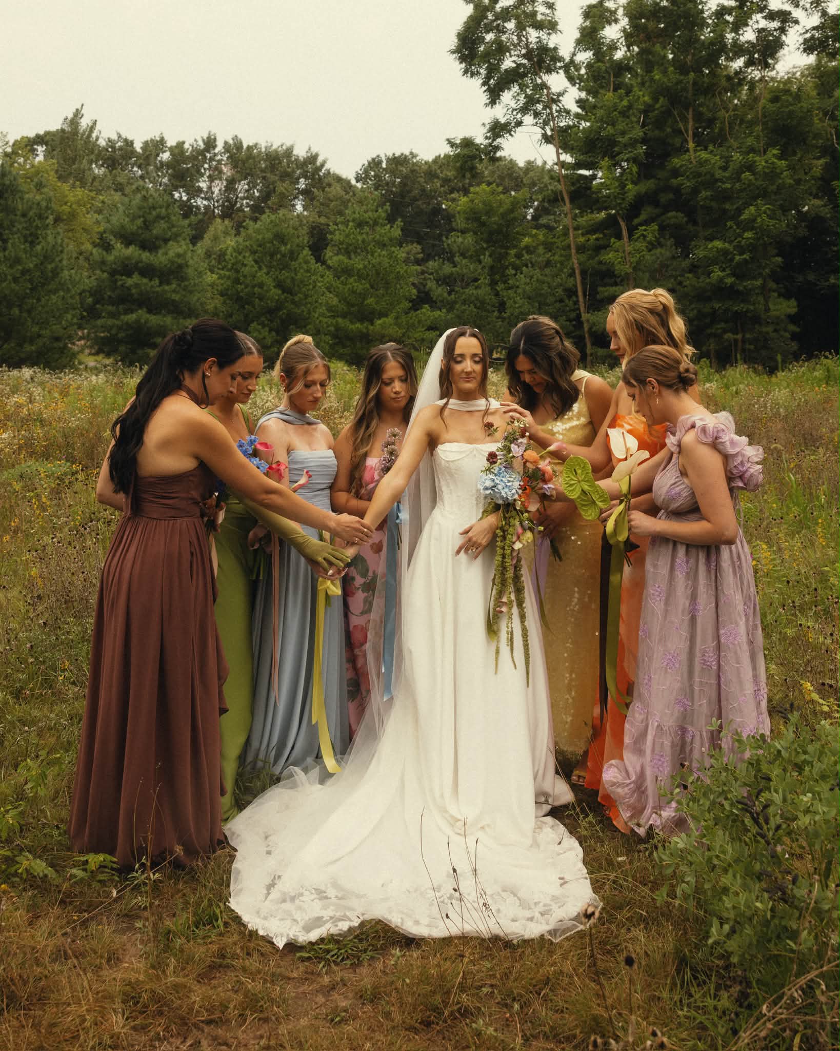 Embellished lace wedding dress with draping pearls