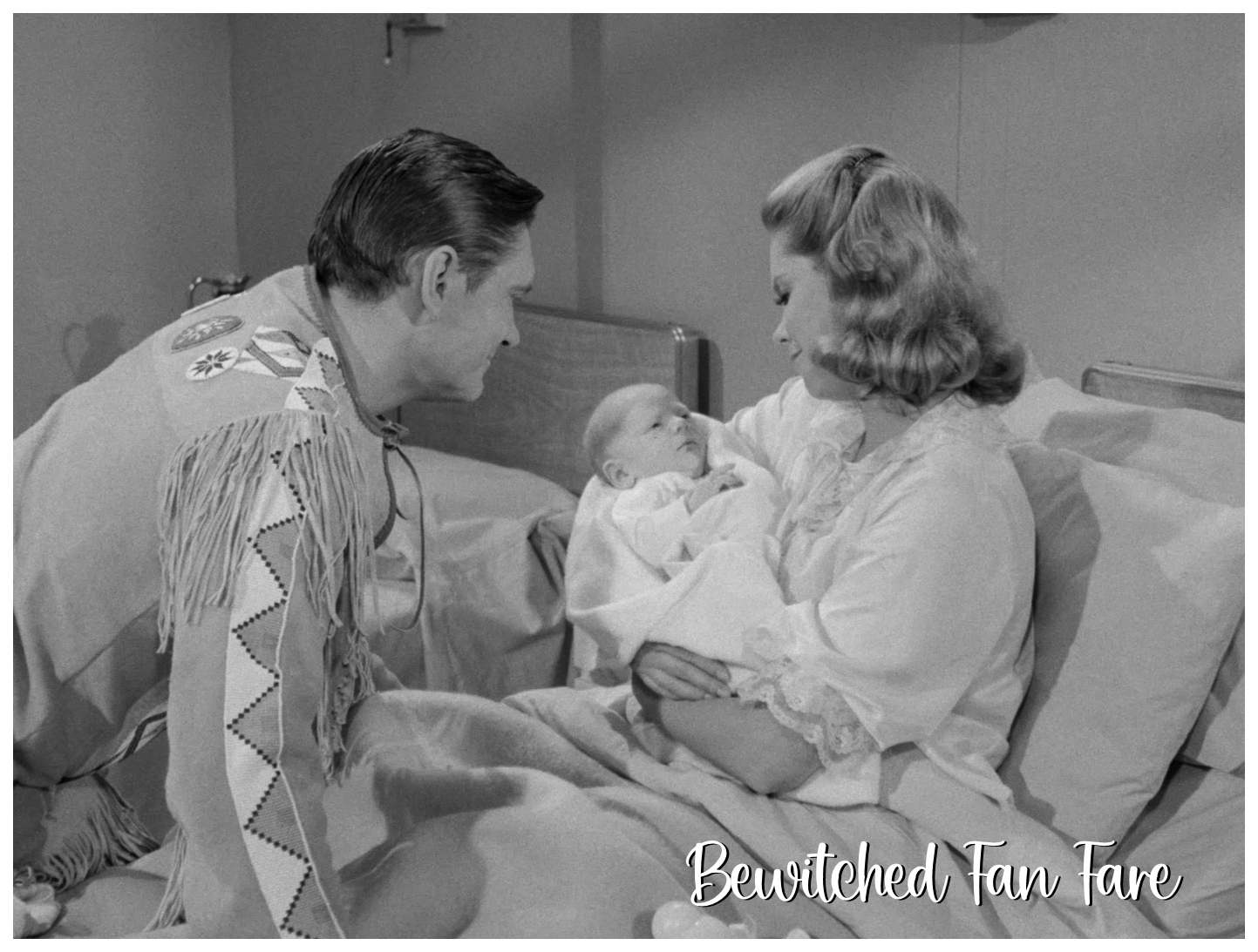 New mother Samantha looks lovingly at her brand new daughter