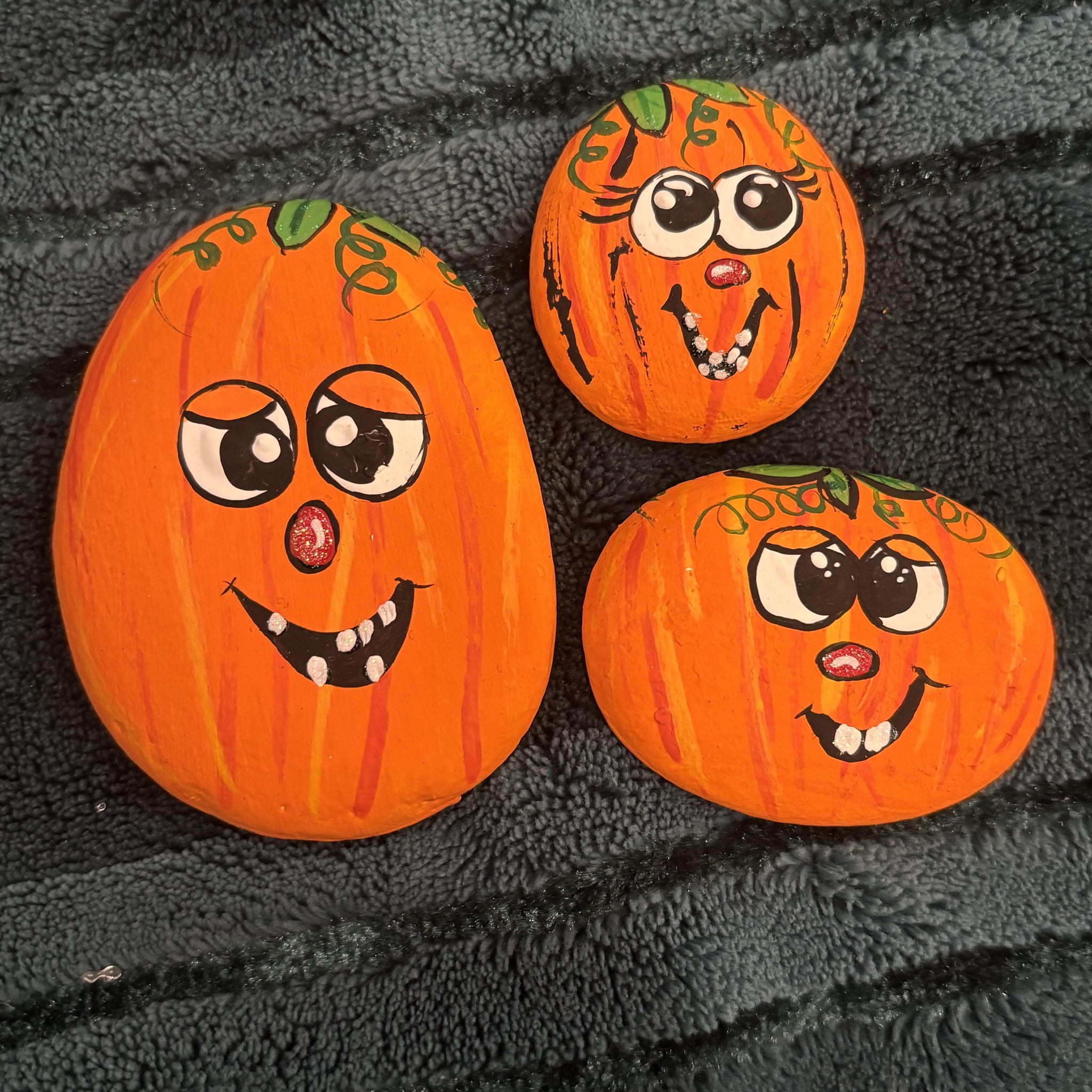 I love passing out painted rocks to our Trick or Treaters along with ...