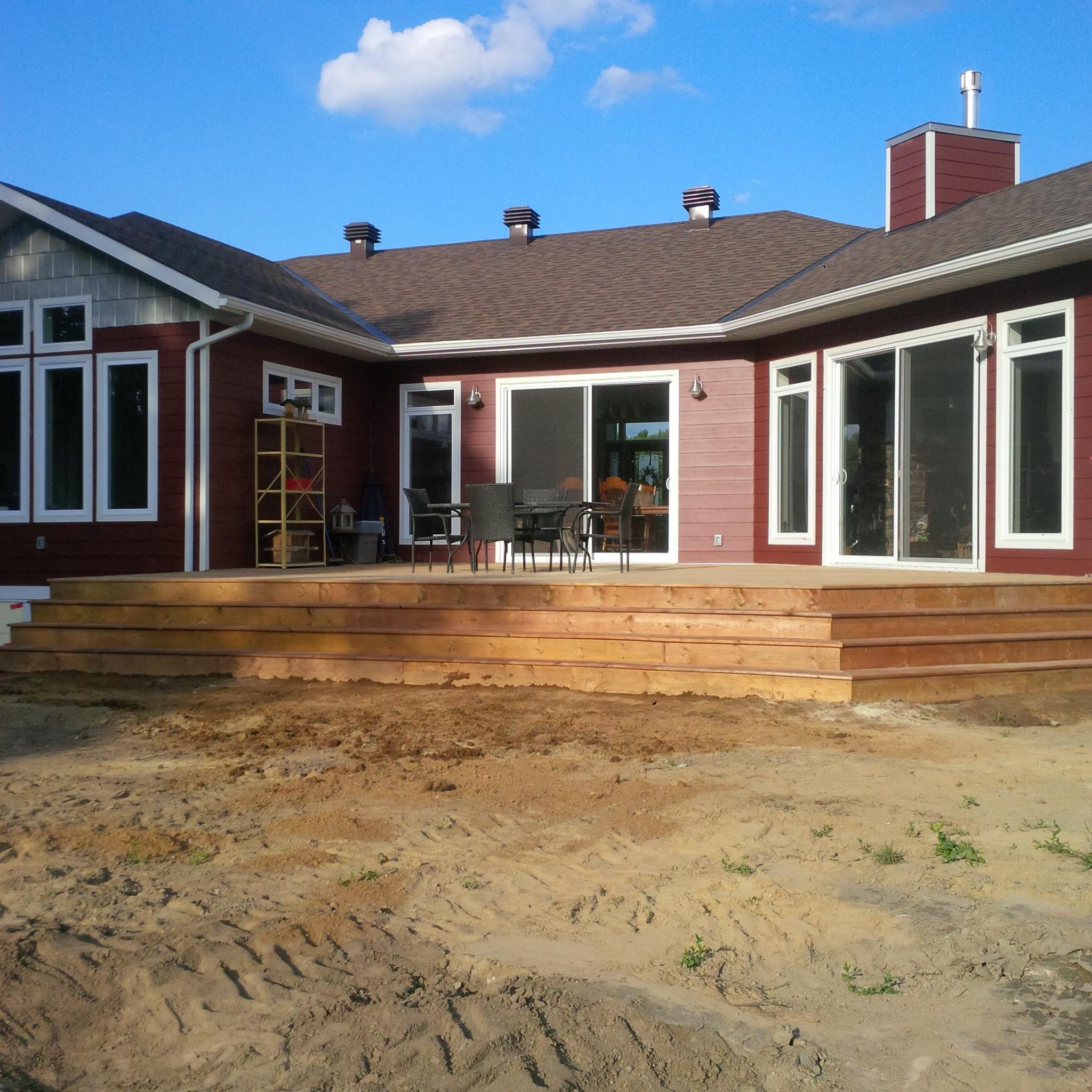 #Beautiful custom #deck with stairs to... - Munro Contracting