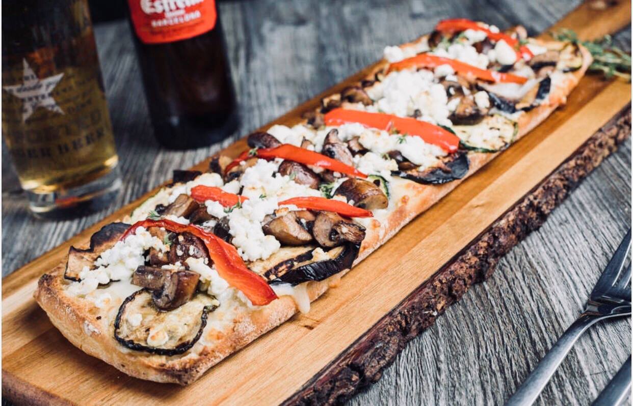 Tapelia - A veggie flatbread paired with a glass of Estrella is the ...