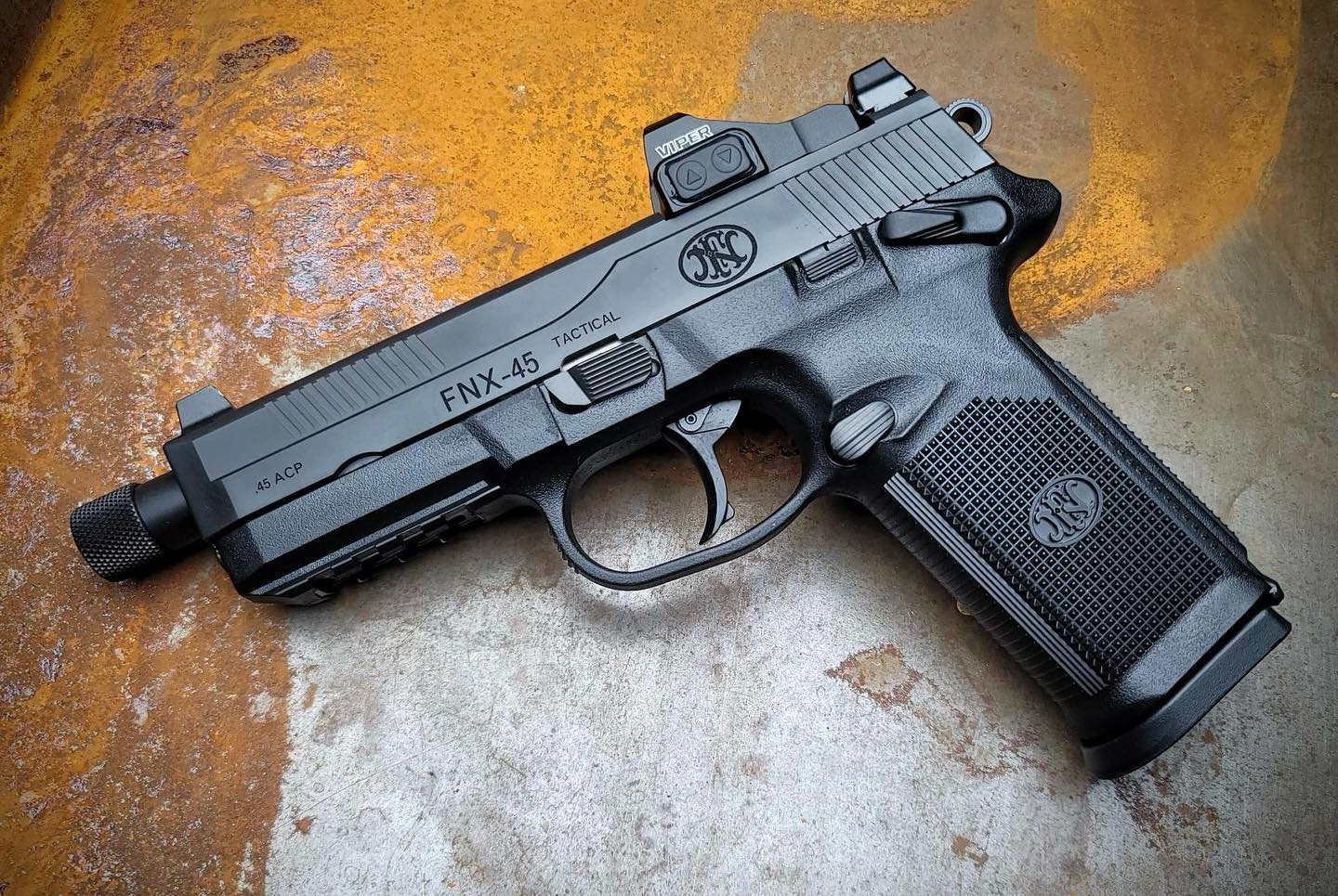 Custom FNX-45 tactical pistol with Burris optic and Cerakote finish