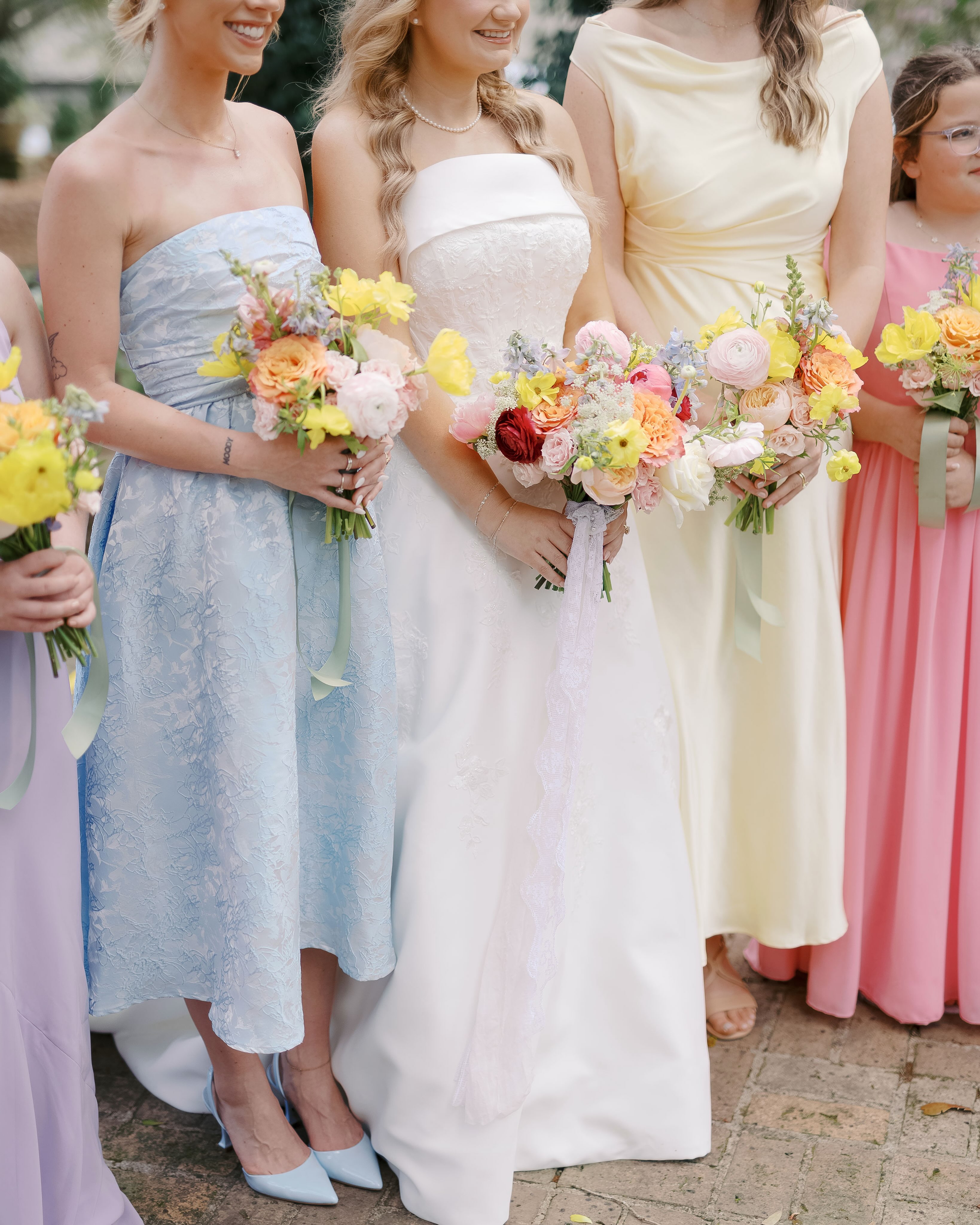Spring pastel bridesmaid dresses and bouquets
