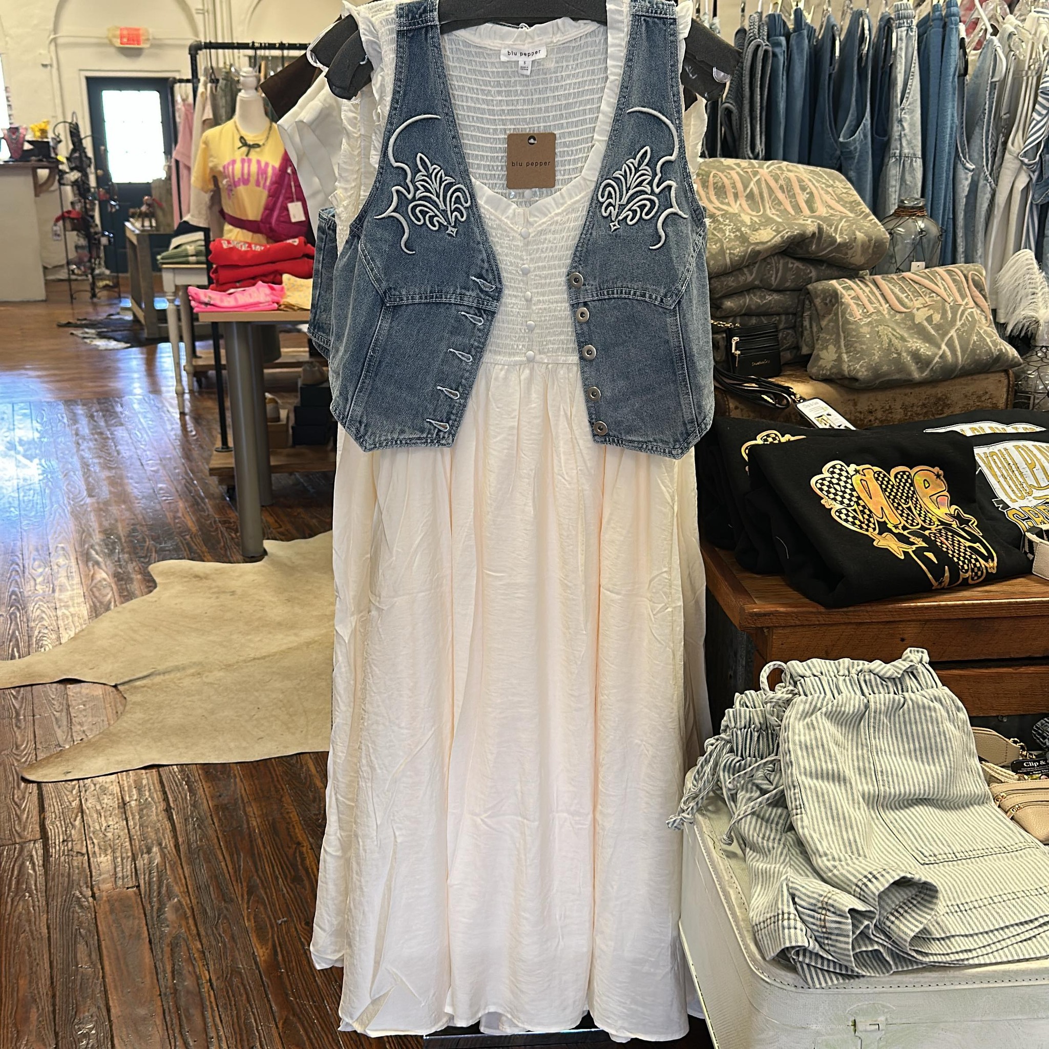 Denim vest and cream dress available in small-large sizes