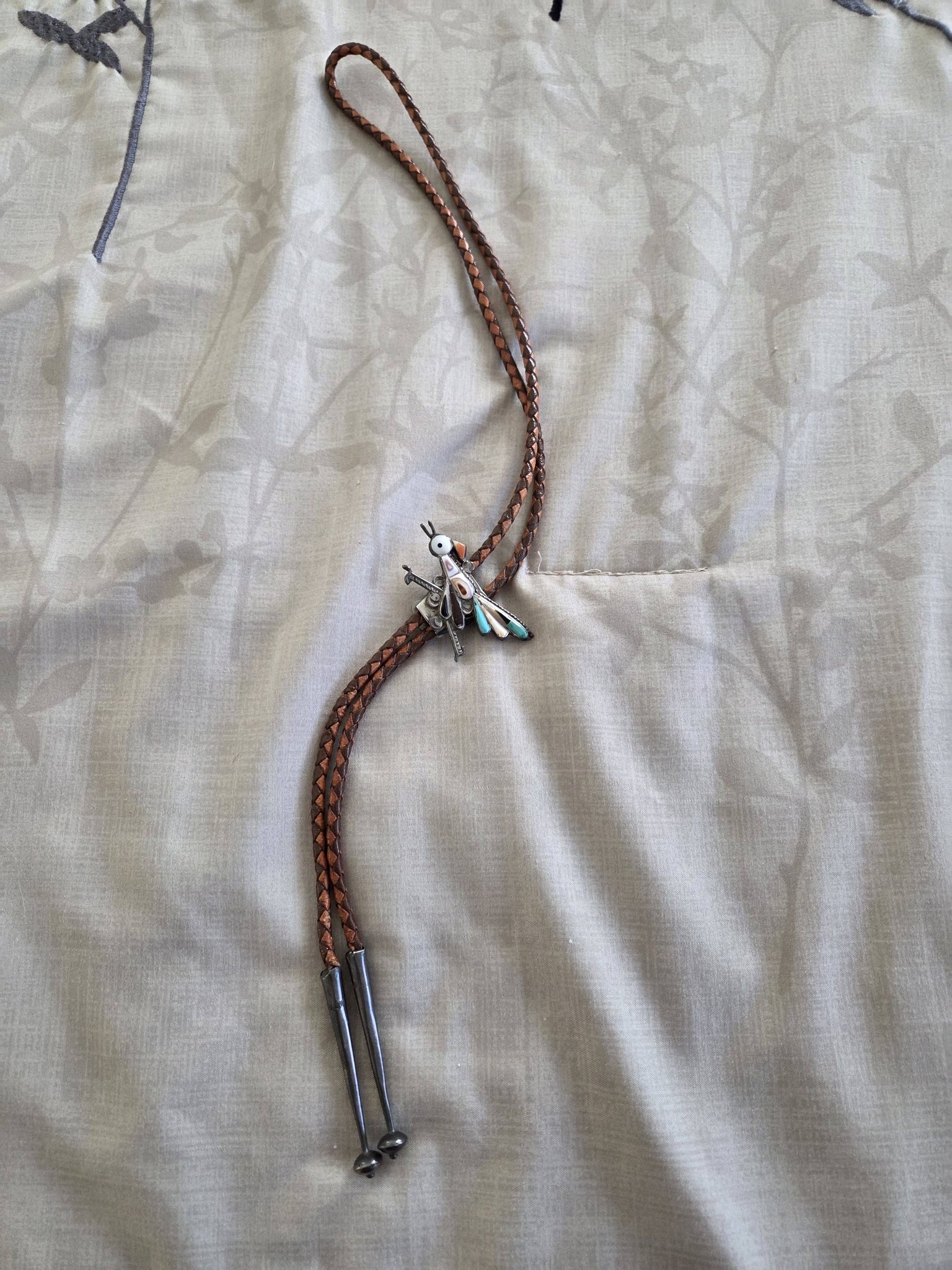 Identify stones in vintage native american bolo tie?