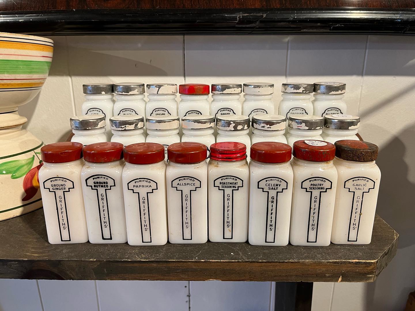 Vintage Griffith milk glass spice jars with wooden rack