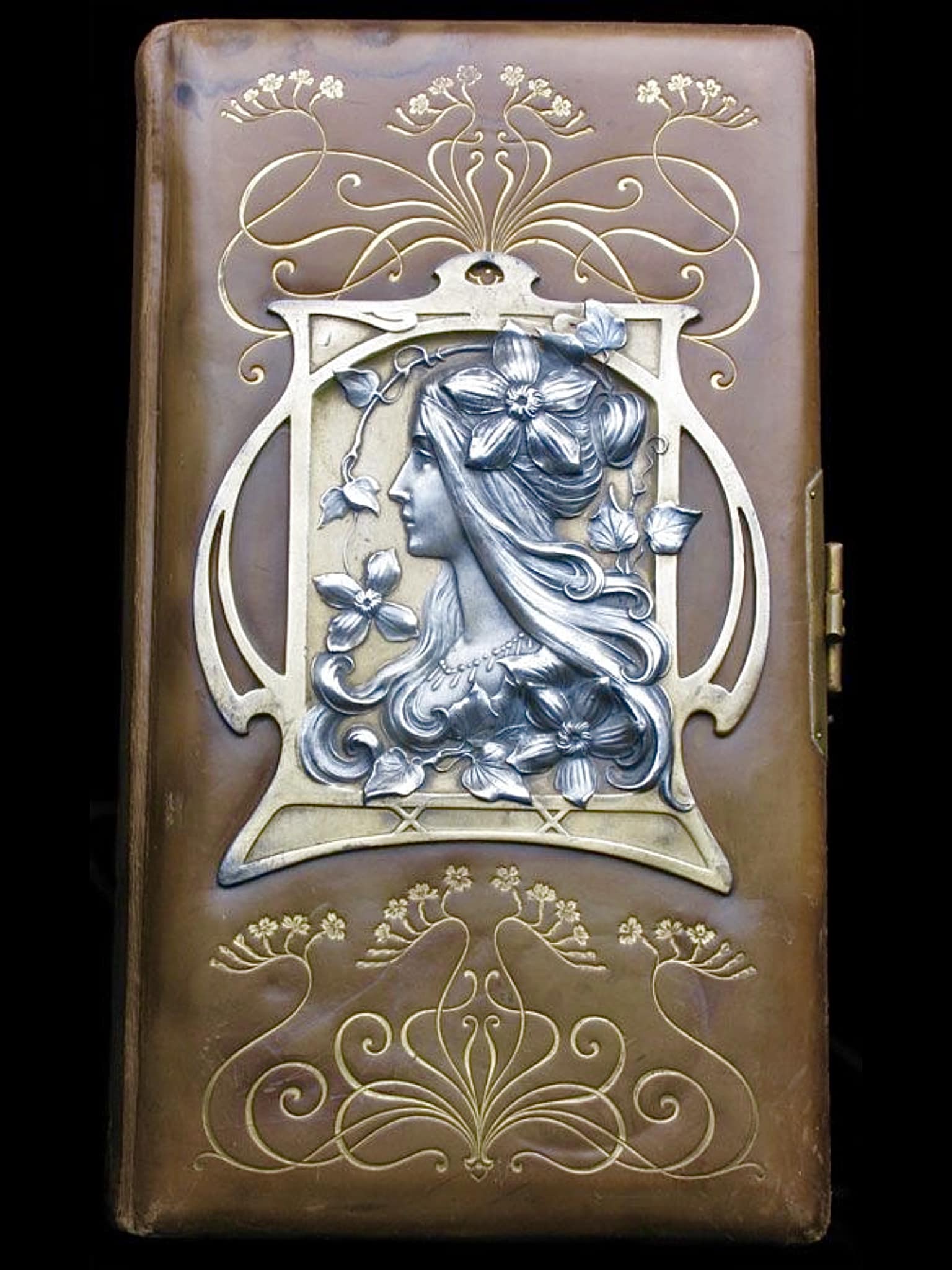 Art Nouveau photo album in silver and leather . France , 1900